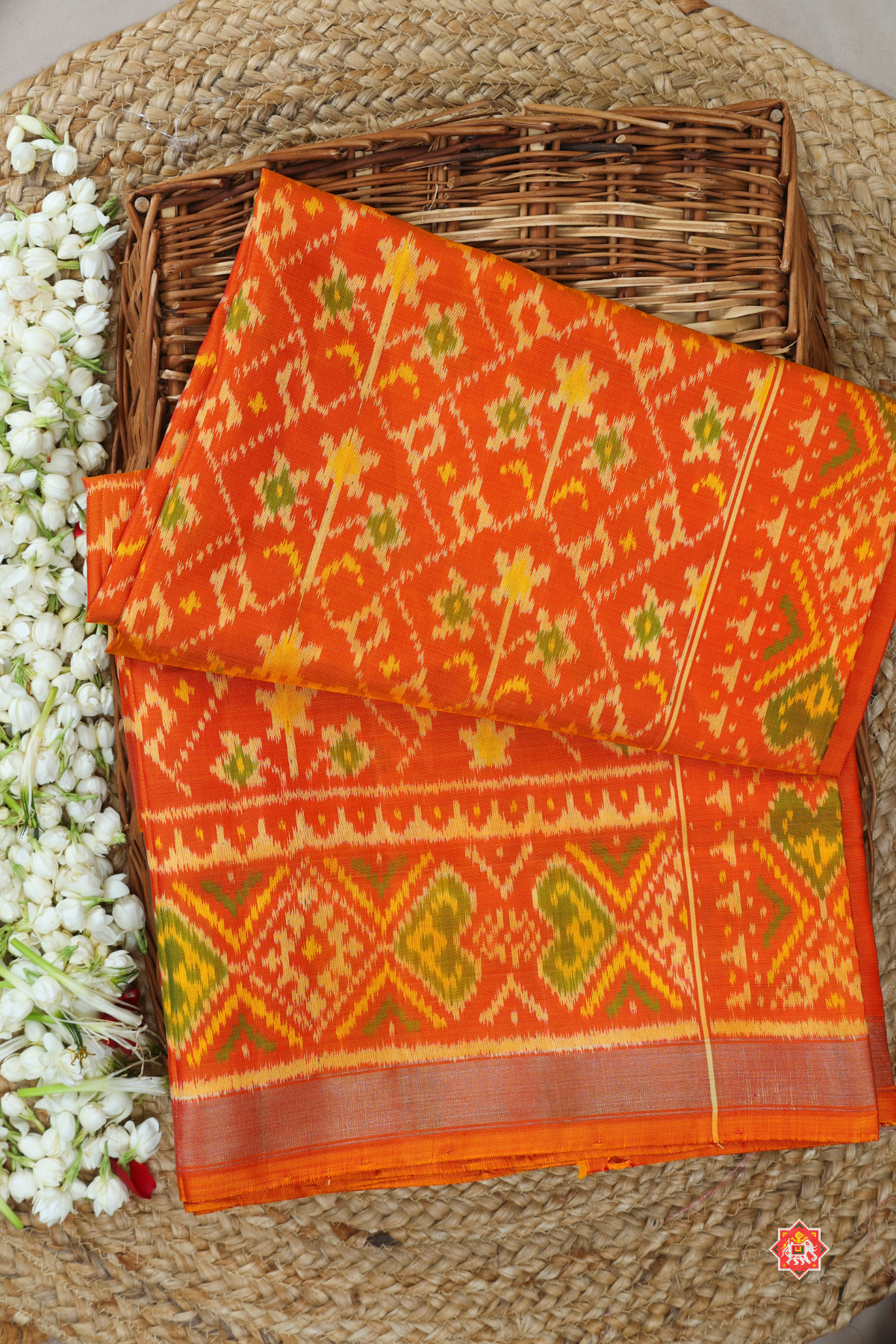 Traditional flowers design small tissue border single ikat patola saree