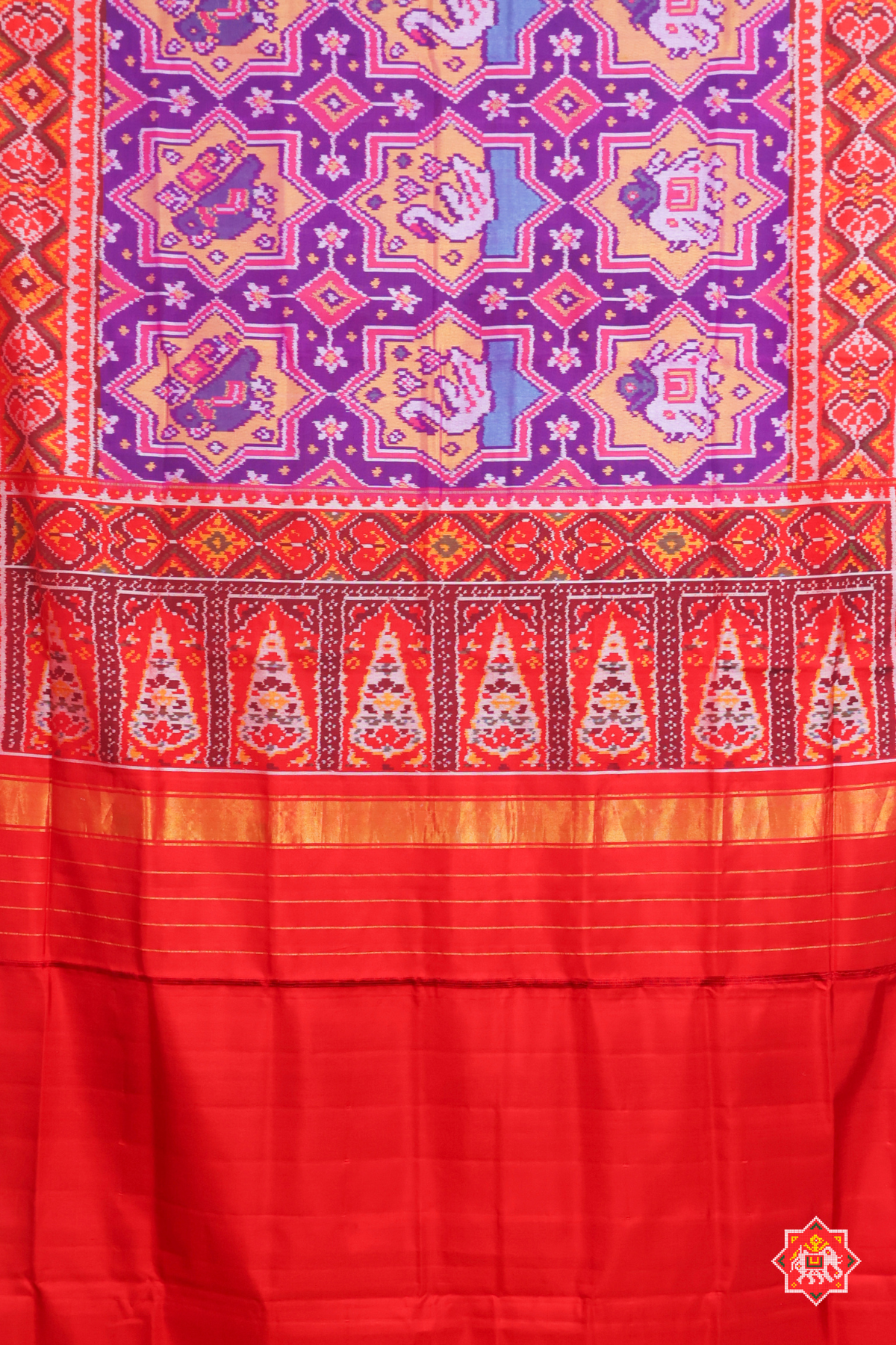 Star with motif design pallu border contras semi double ikat patola saree