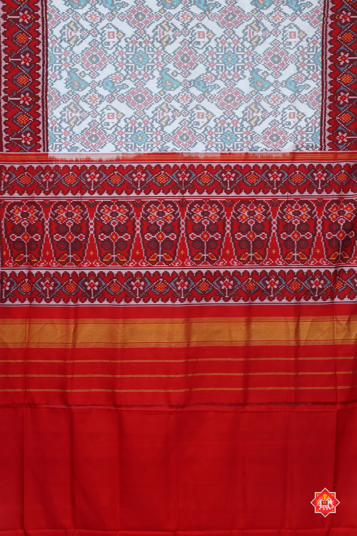Navratna design with elephant design semi double ikat patola saree