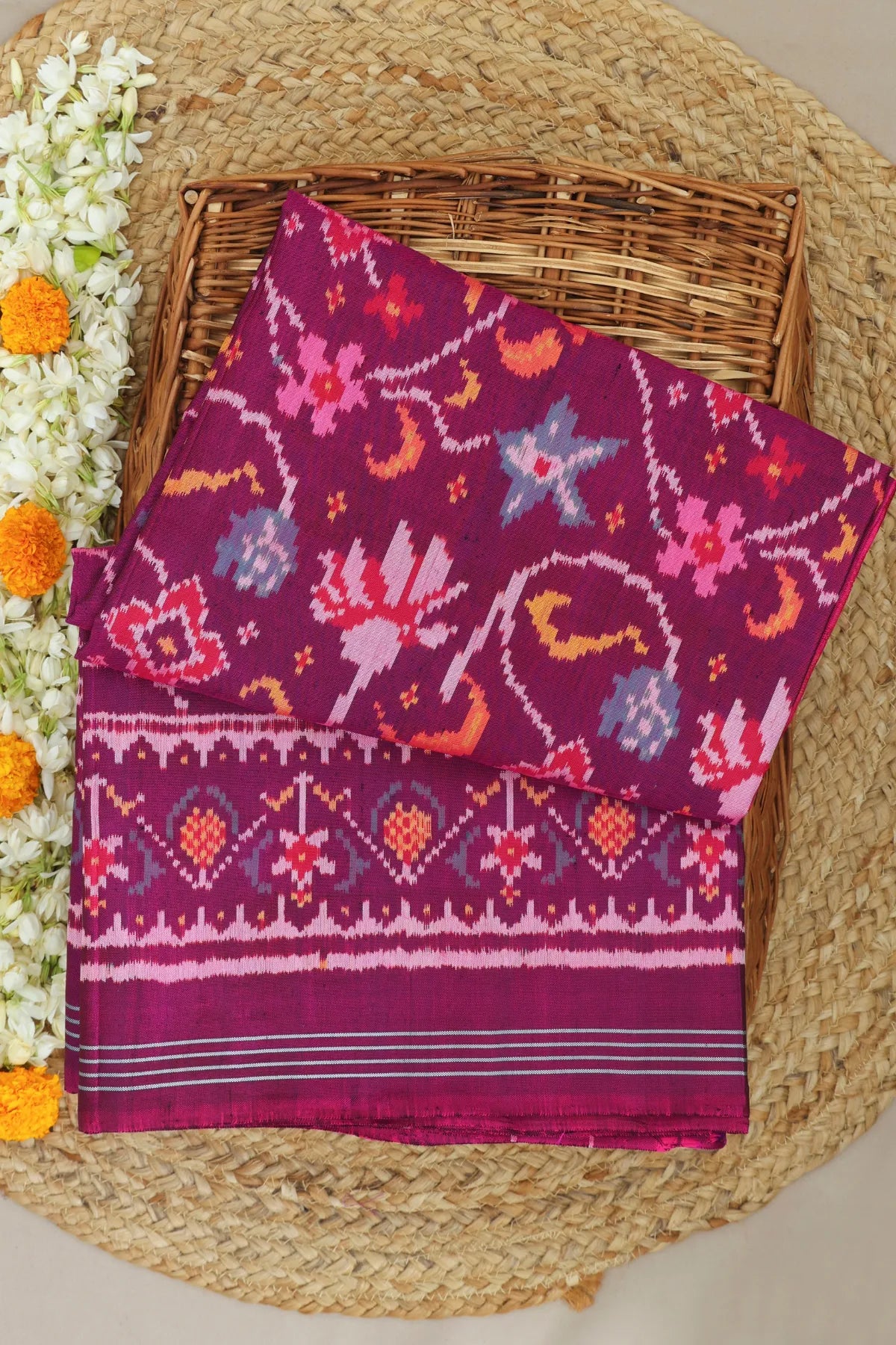 Rangoli design with lines border traditional deisgn pallu semi double ikat patola saree
