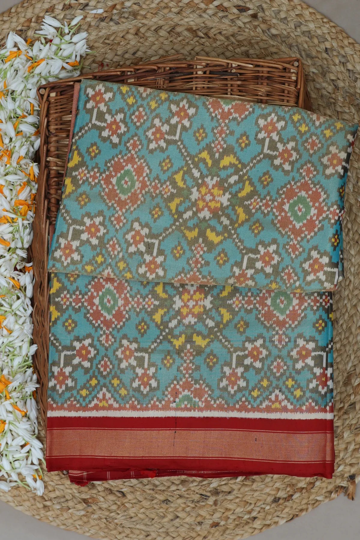 Navratna design with minakari work  tissue patola saree