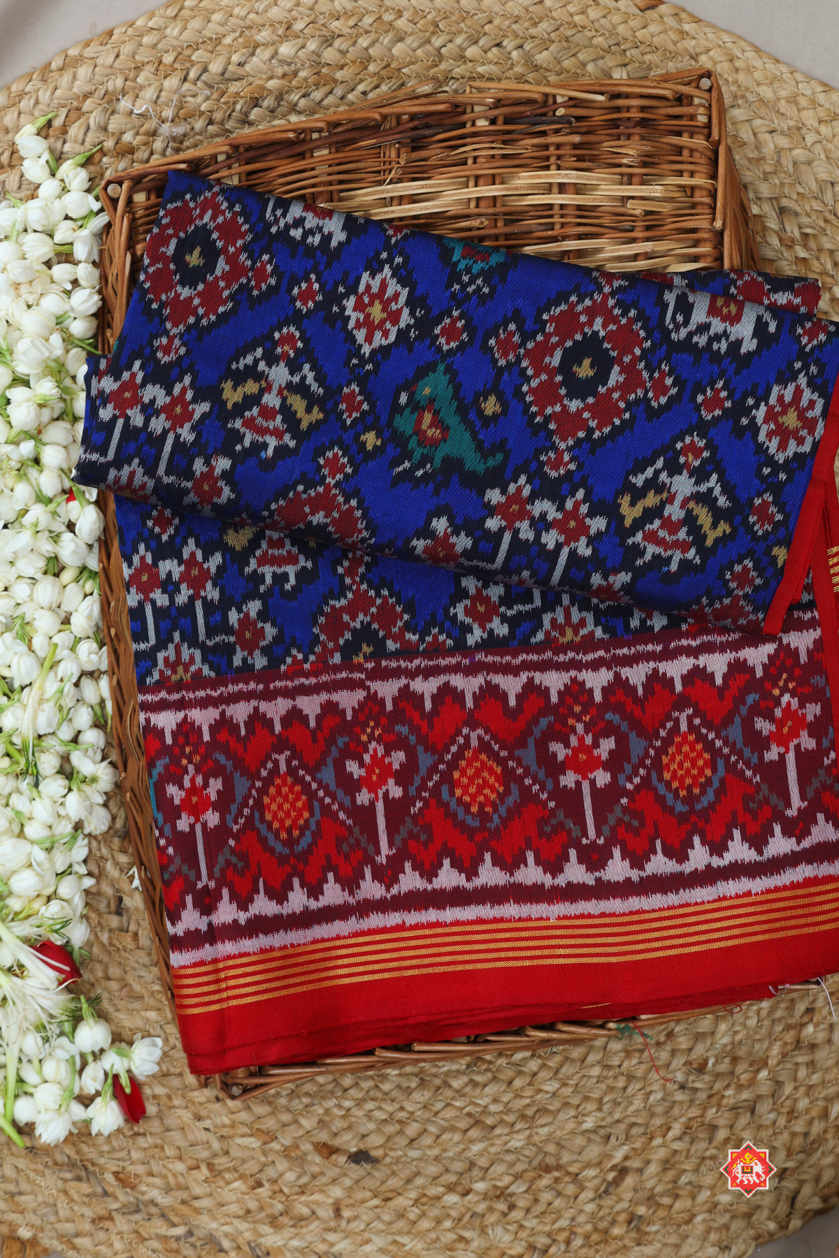 Traditional navratn design with small motif design semi double ikat patola saree