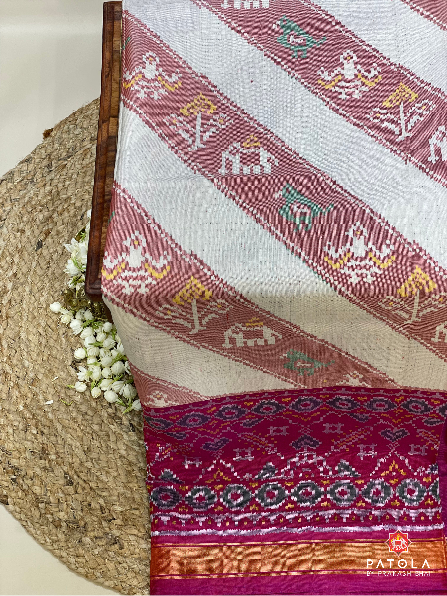 Manekchowk Scut Boder Semi Double Ikat Patola Saree