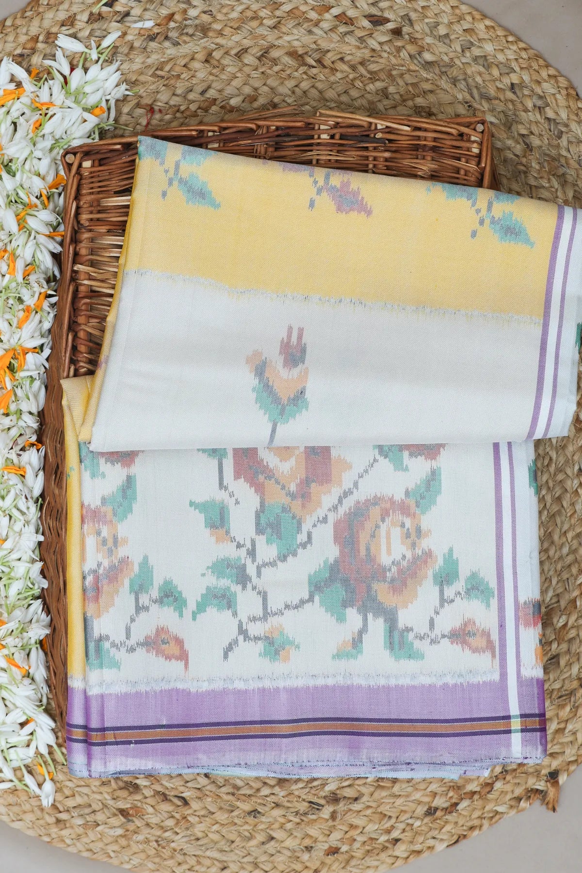 Masterpiece suct border with flower design pallu semi double ikat patola saree