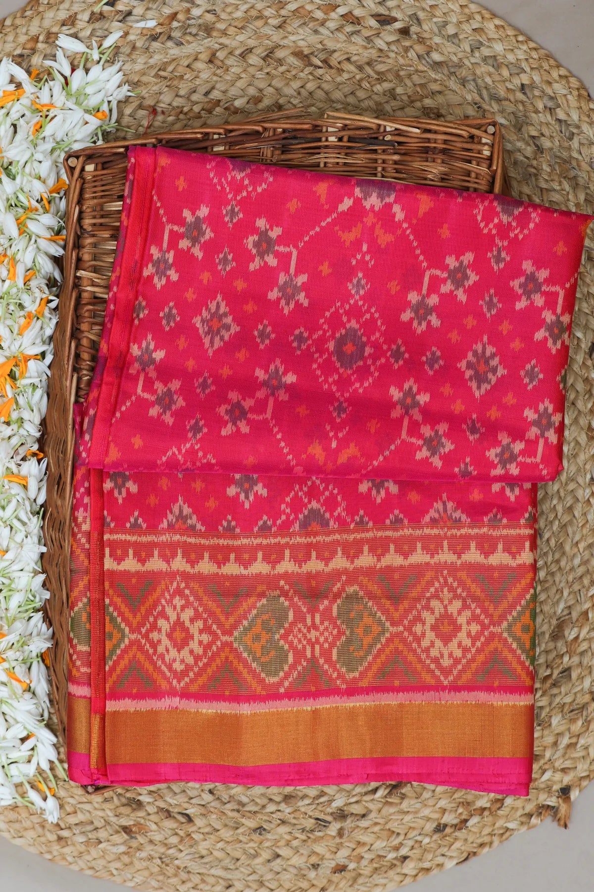 Navrtana design with tissue border single ikat patola saree