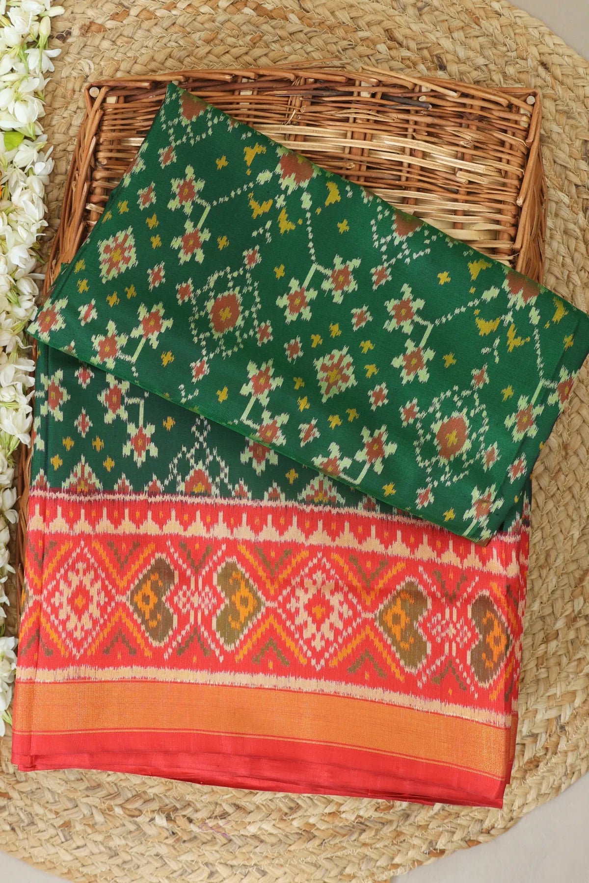 Navratna design with pallu border contras single ikat patola saree