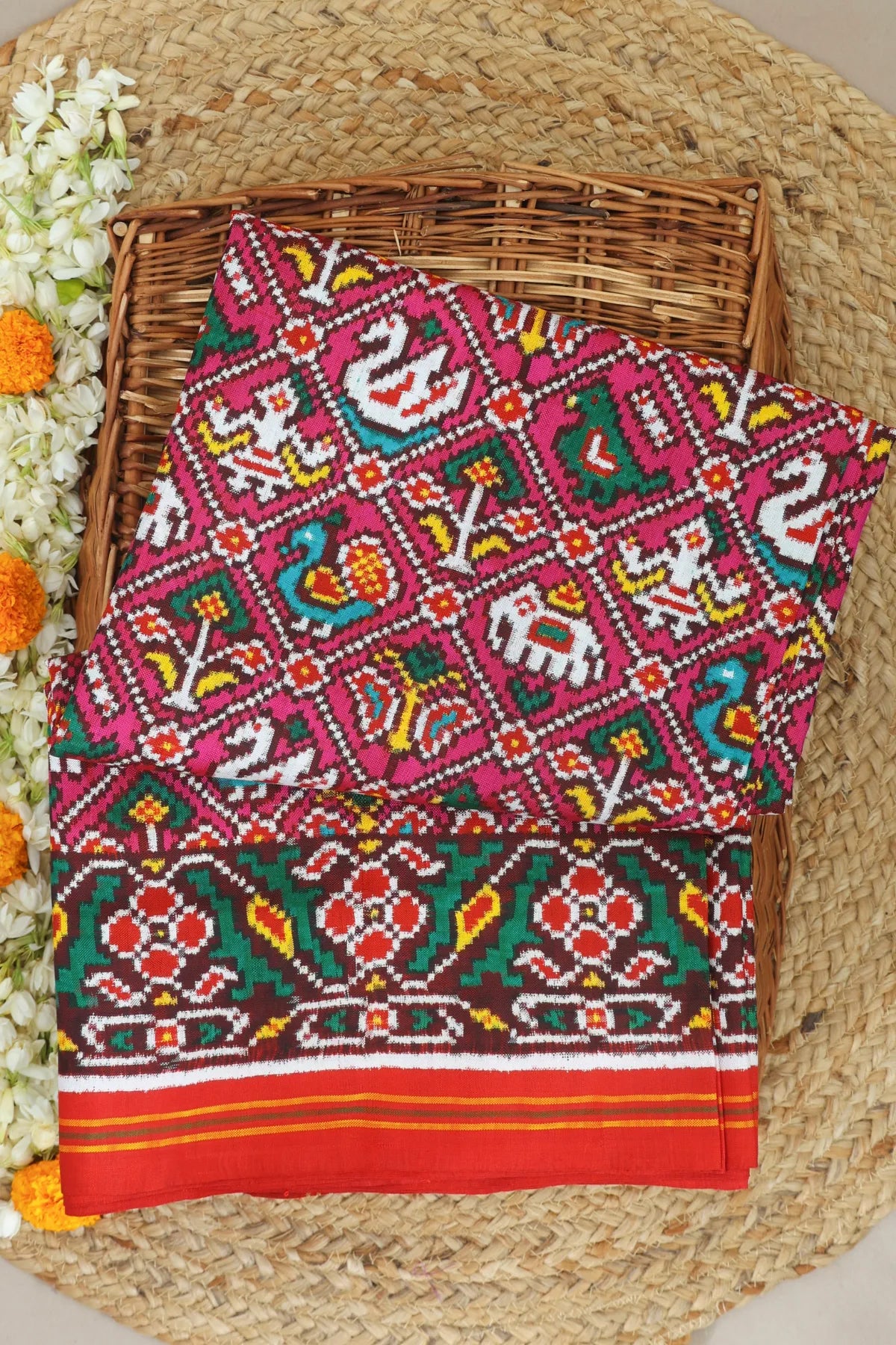 Patan patola tradtional nari kunjar with flower border pure double ikat saree