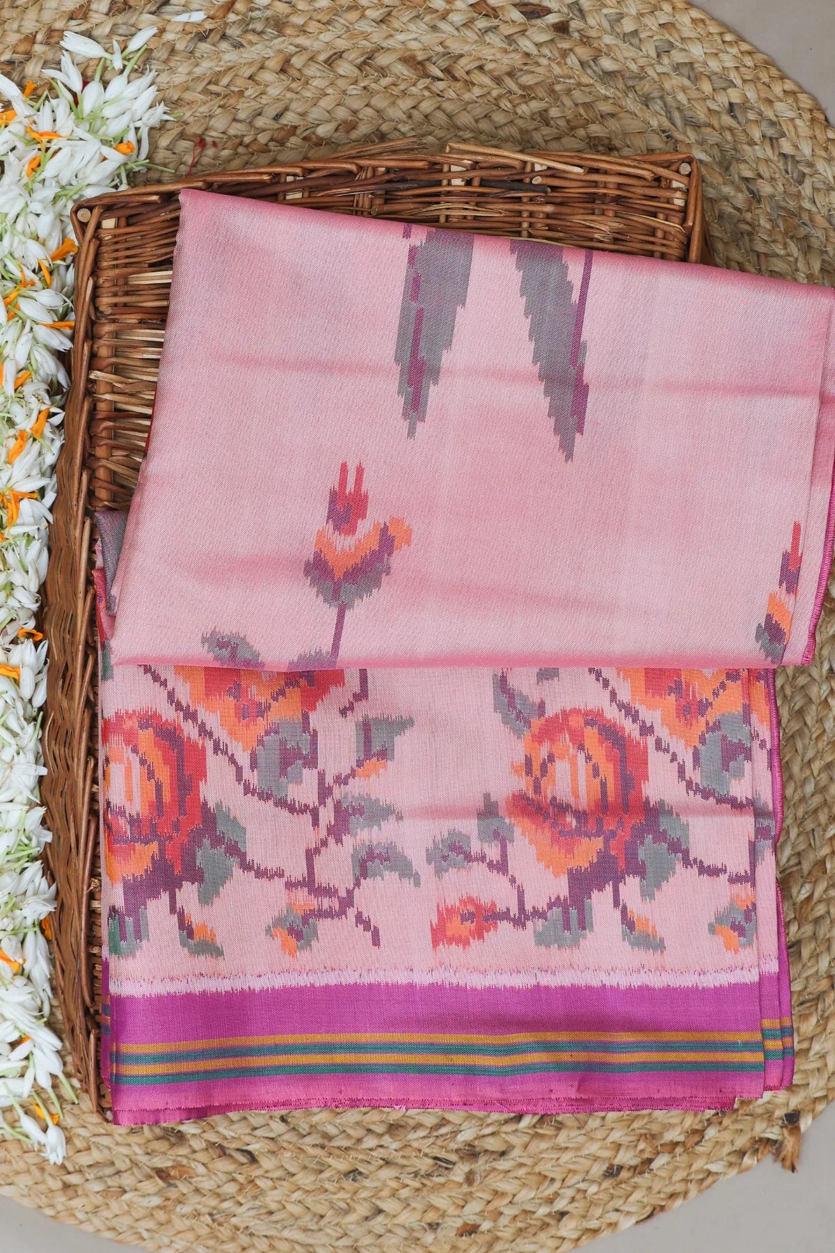 Masterpiece suct border with flower design pallu semi double ikat patola saree