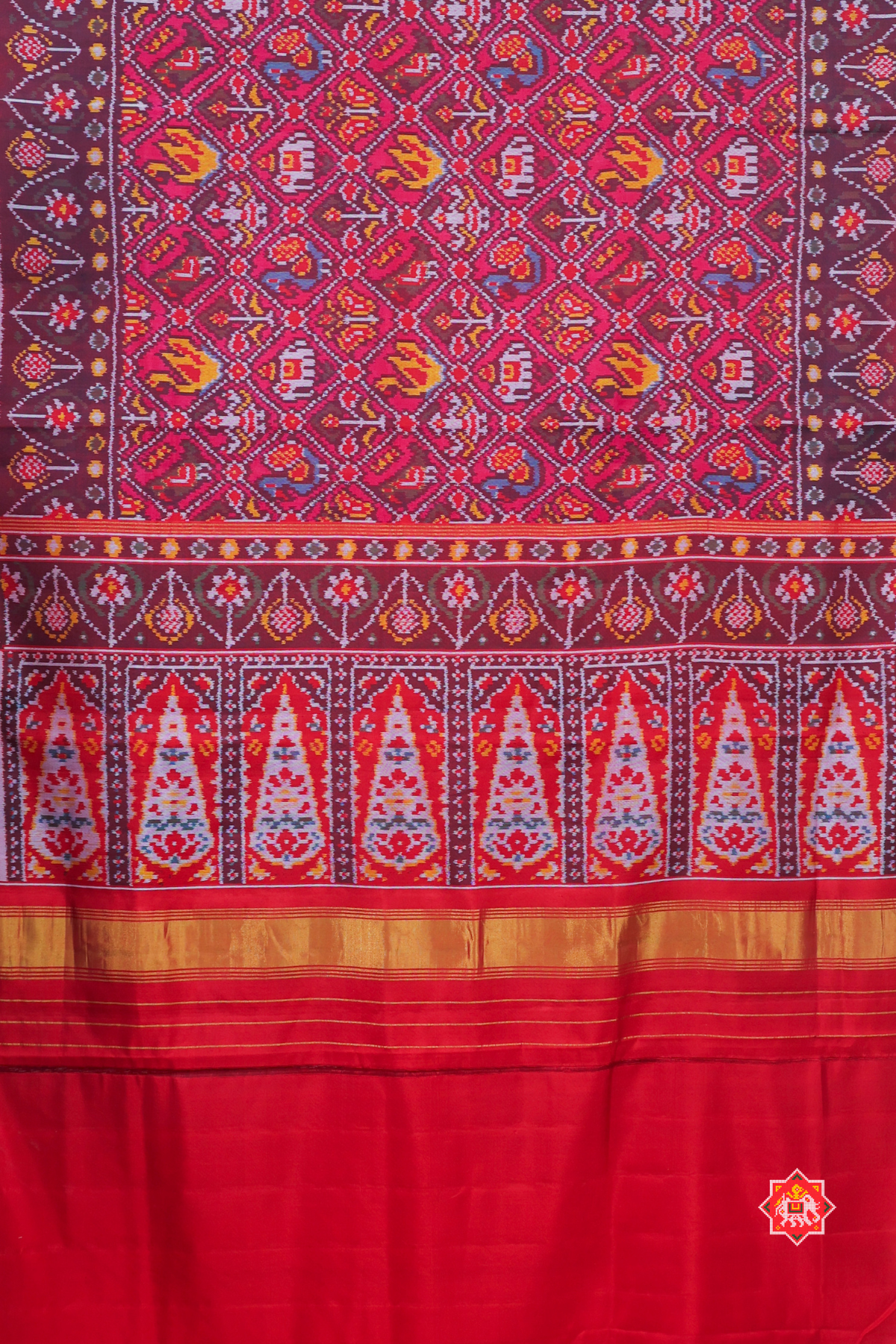 Nari kunjar design with border pallu flower design semi double ikat patola saree