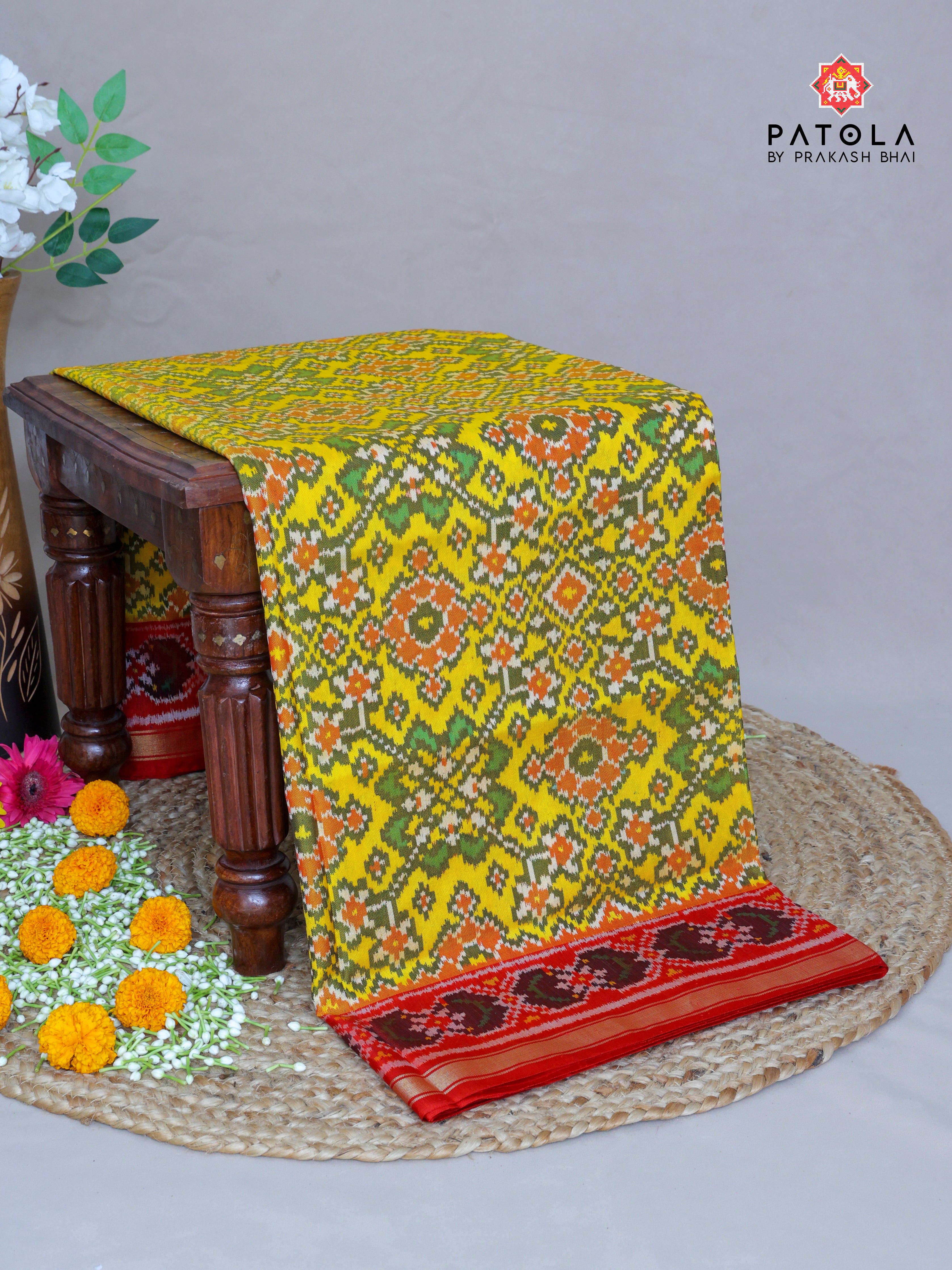 Yellow Navratna Designer Semi Double Ikat Patola Saree