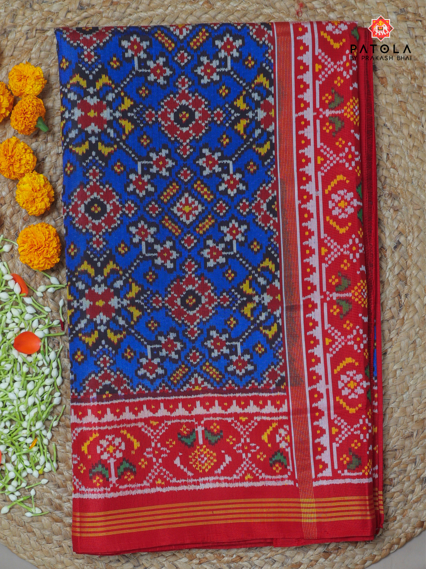 Navratna design with ghughro  border semi double ikat patola saree