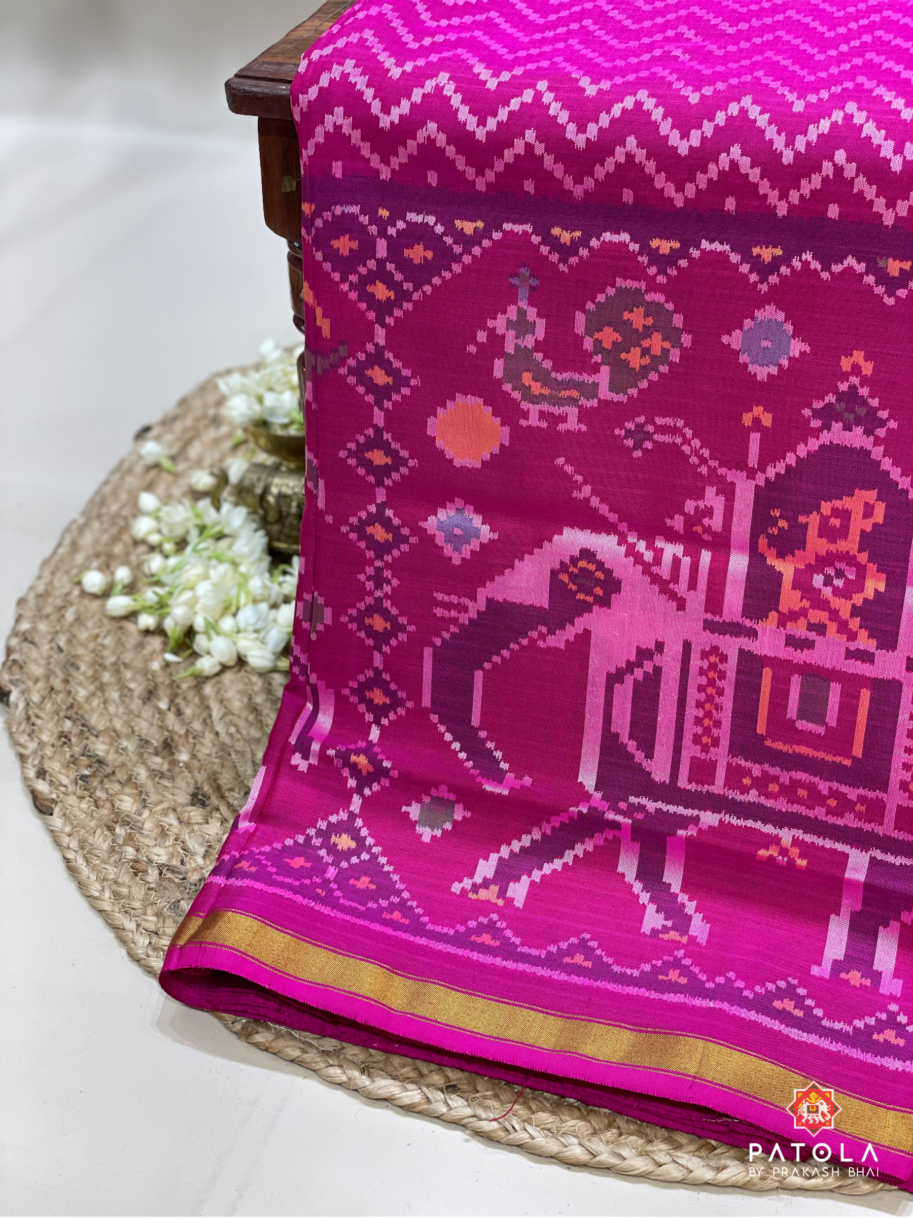 Zig-Zag Design With Elephent Scut Border Semi Double Ikat Saree