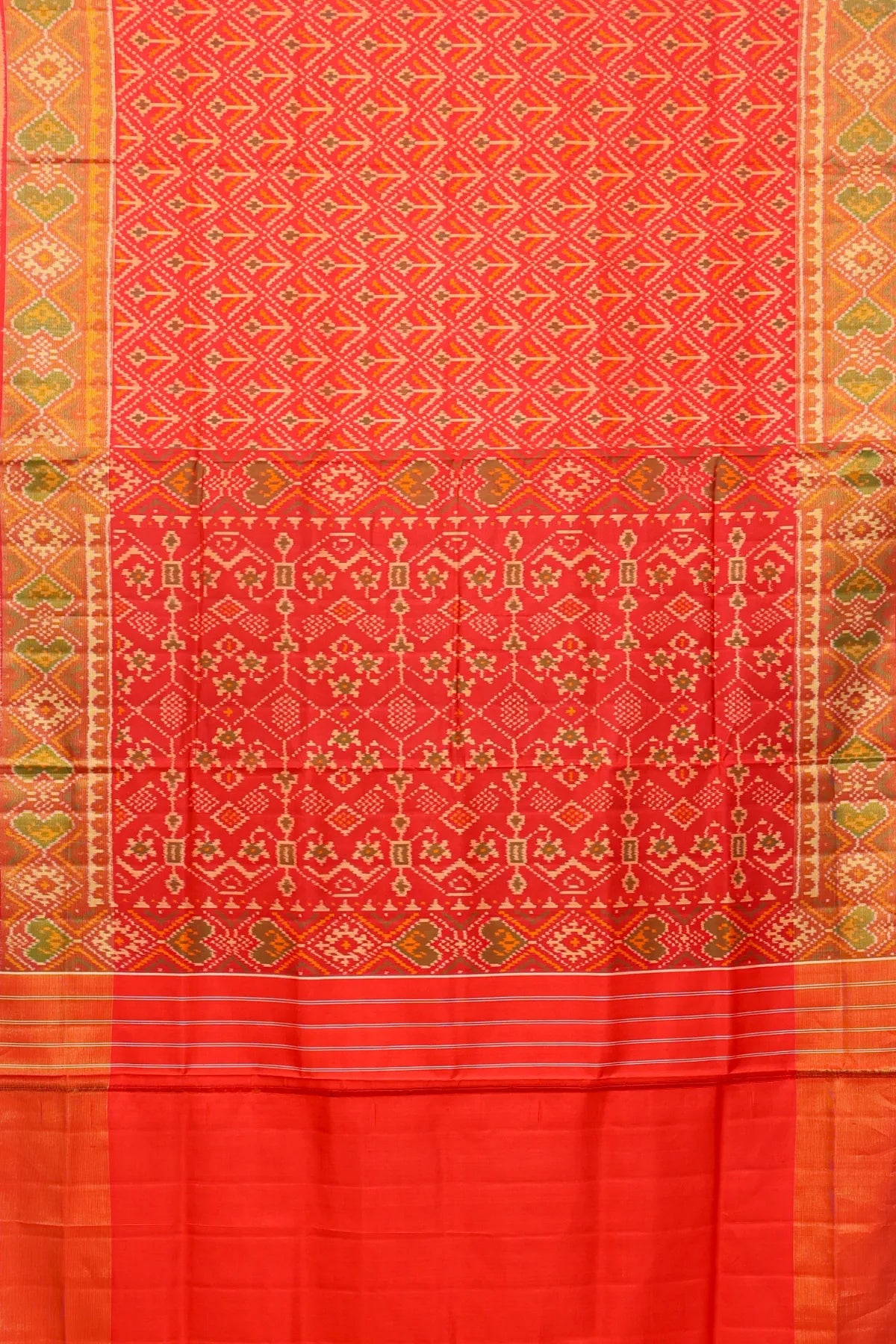 Plain color fancy flower design with tissue border single ikat patola saree