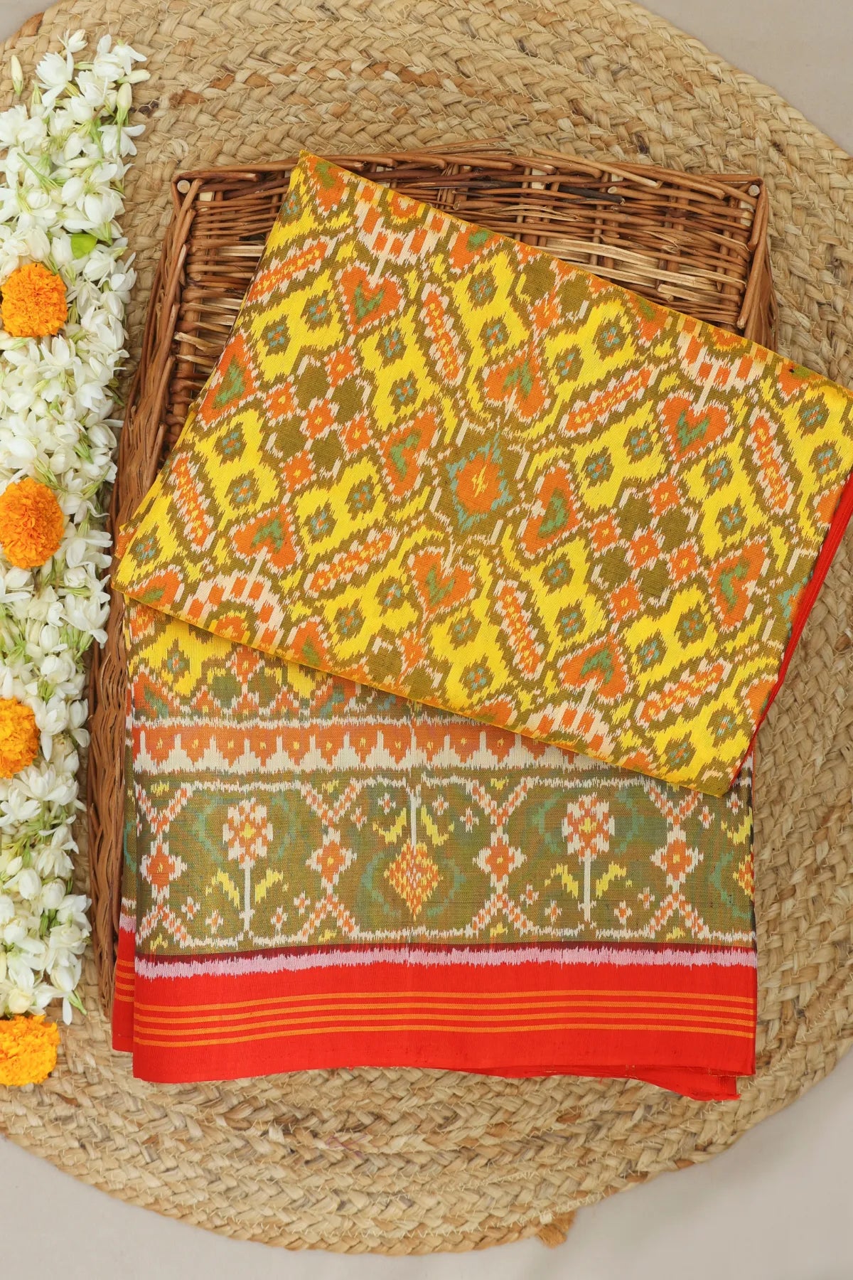 Minakari work & manek chowk design with ghughroo pallu border single ikat patola saree