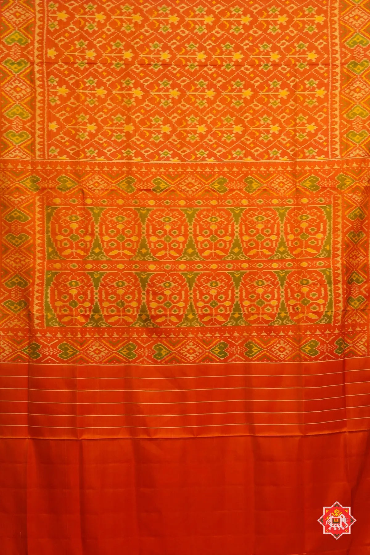 Traditional flowers design small tissue border single ikat patola saree