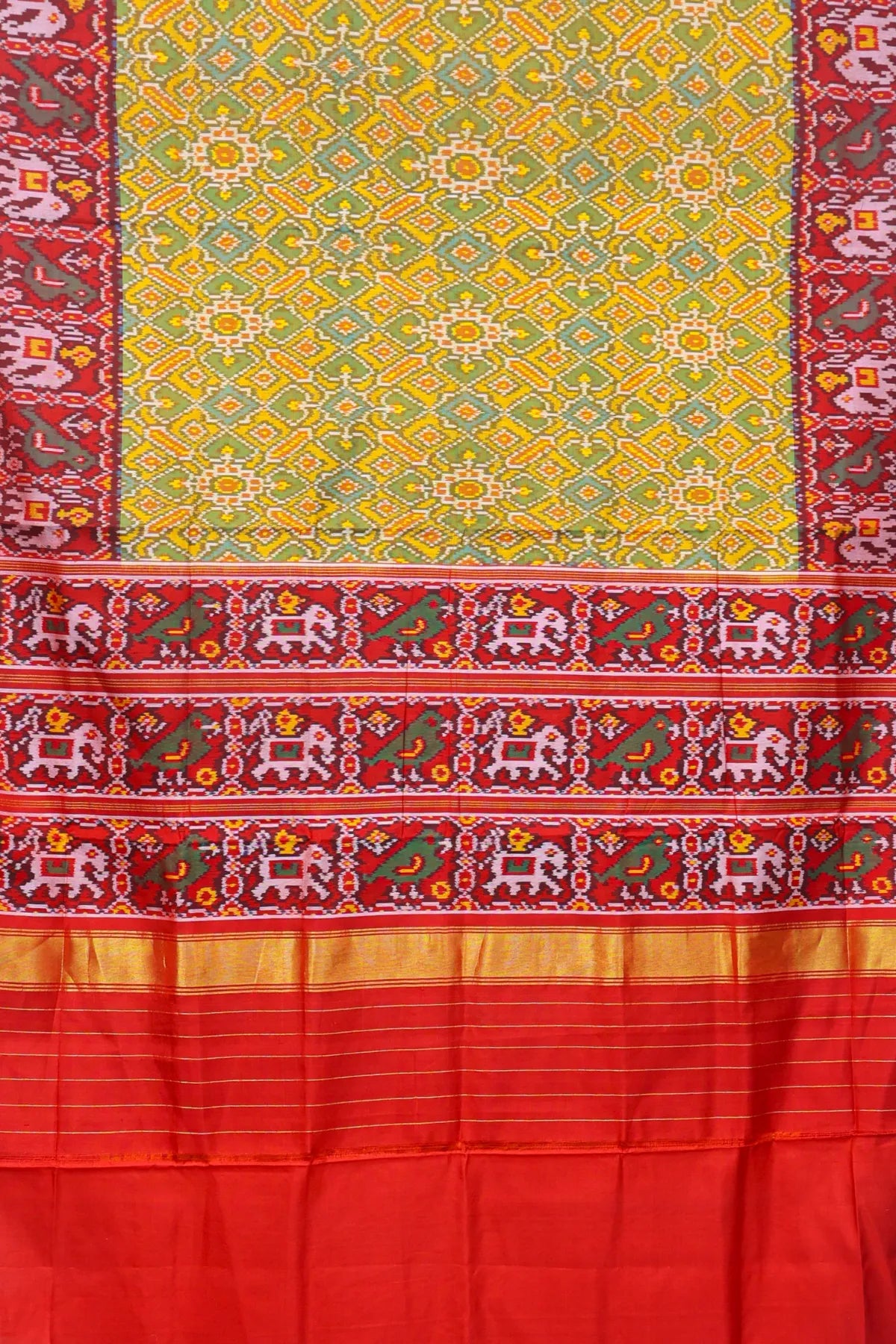 Paan chanda with motifs designer border and pallu contras Semi double ikat patola saree