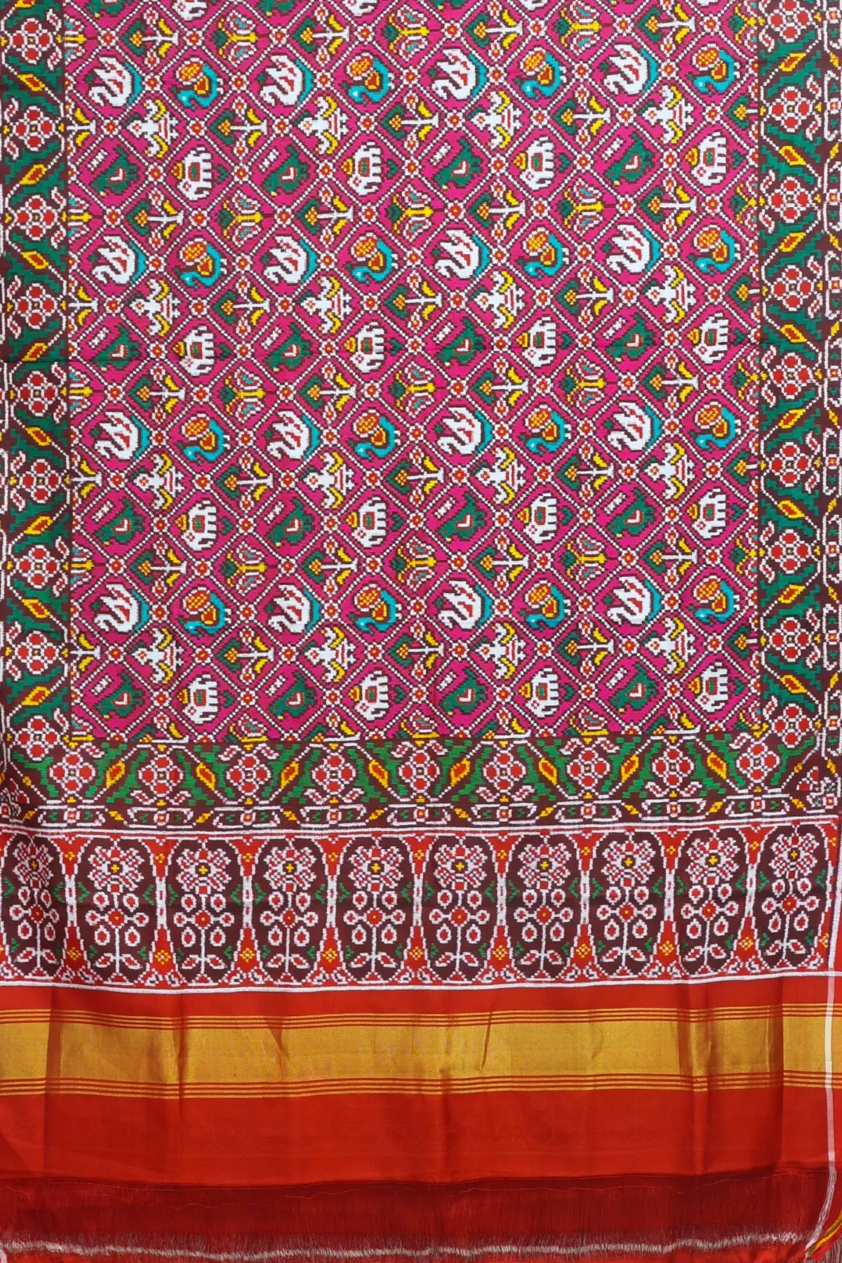 Patan patola tradtional nari kunjar with flower border pure double ikat saree