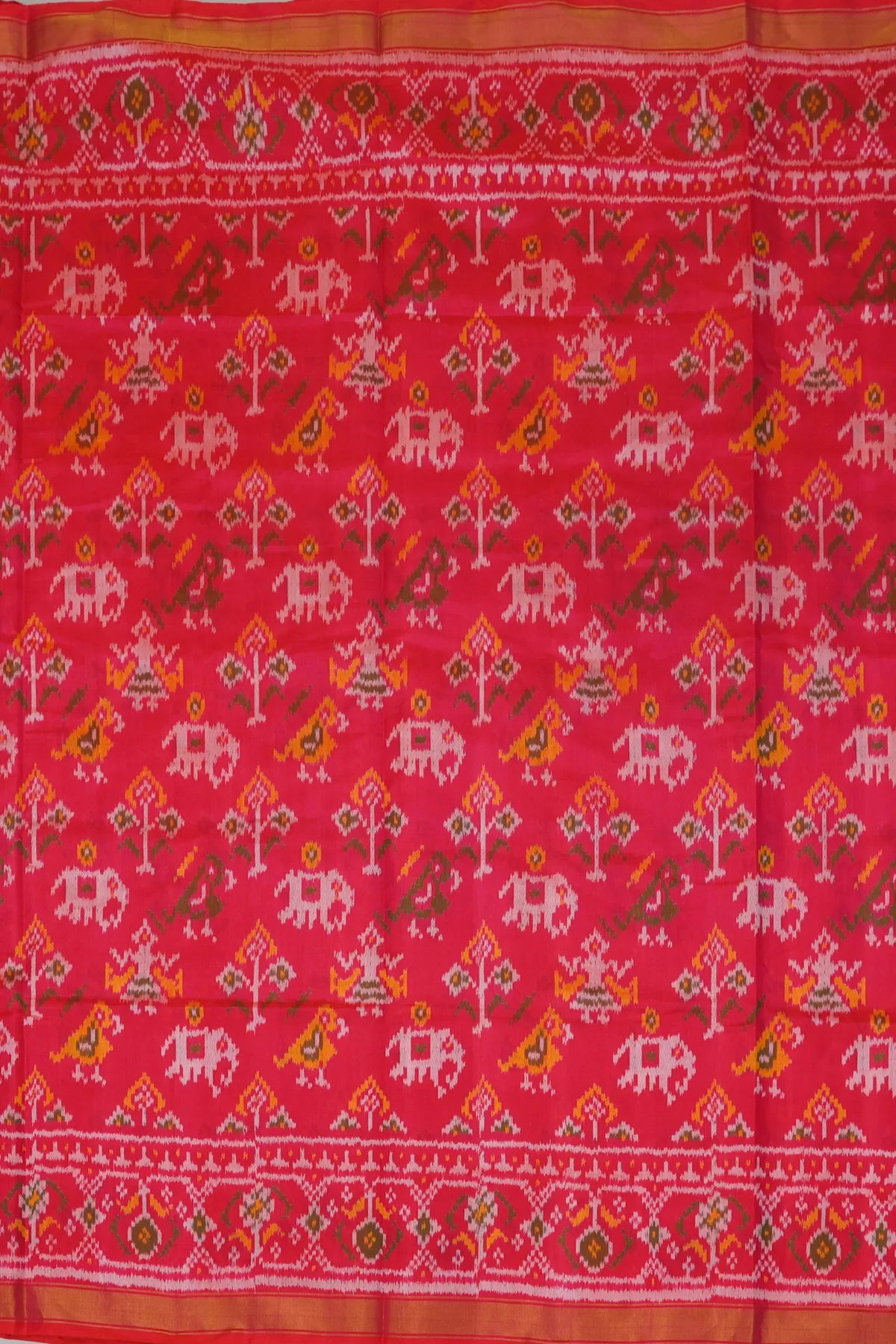 Traditional motif design with small tissue border single ikat patola saree