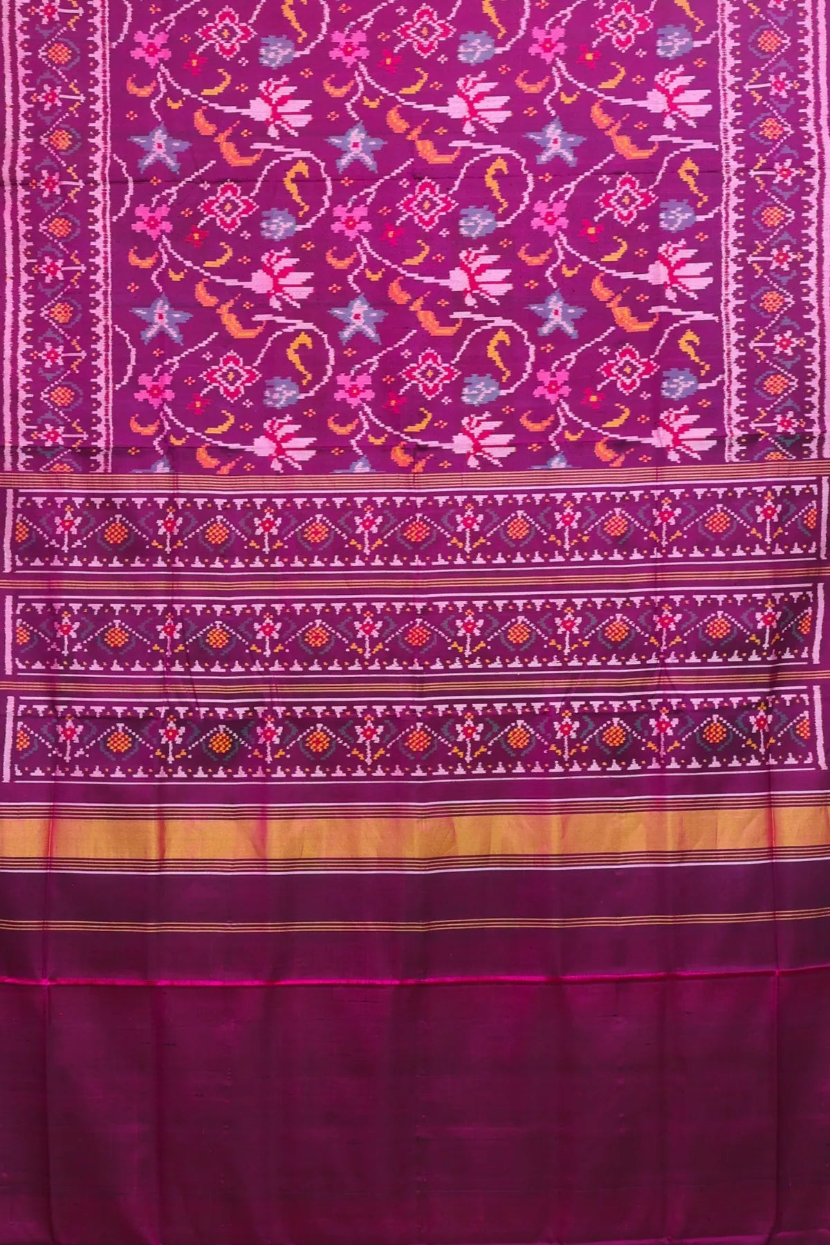 Rangoli design with lines border traditional deisgn pallu semi double ikat patola saree