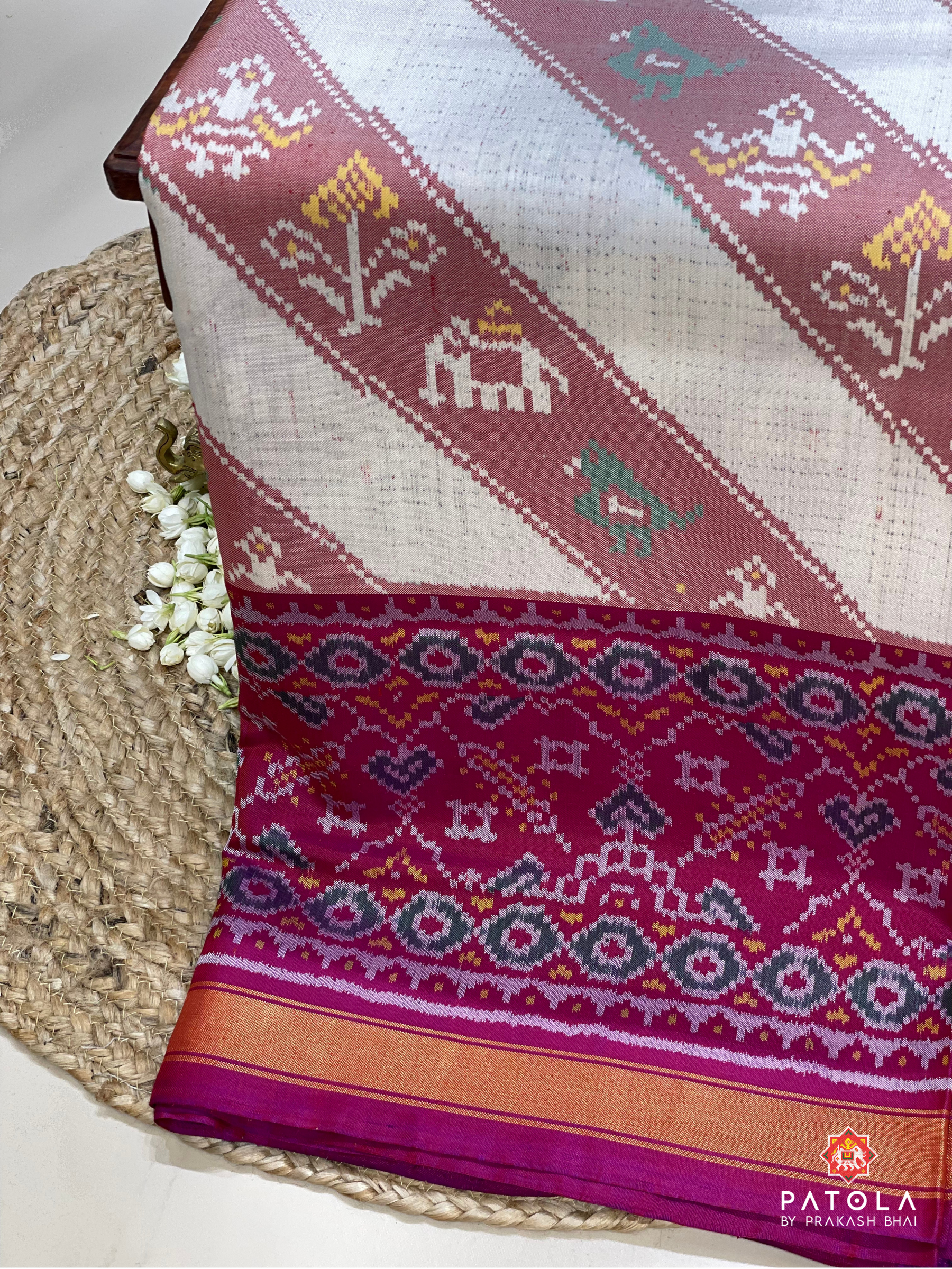 Manekchowk Scut Boder Semi Double Ikat Patola Saree