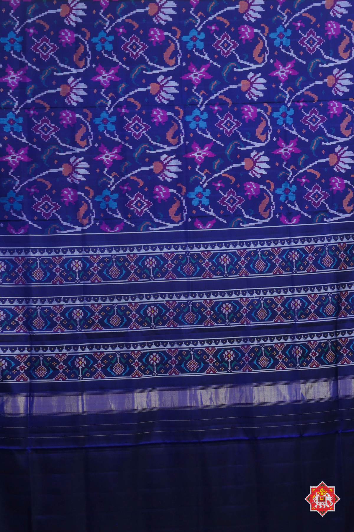 Master piece flowers with leaves design & small lines border semi double ikat patola saree