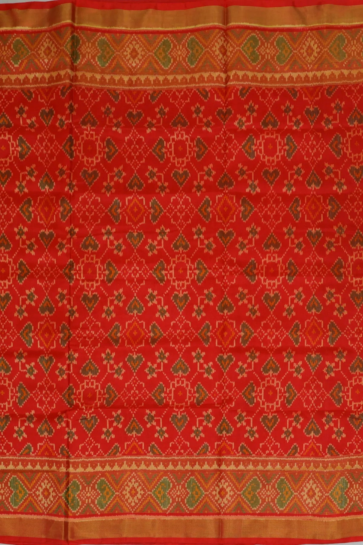 Paan chanda design with tissue border single ikat patola saree