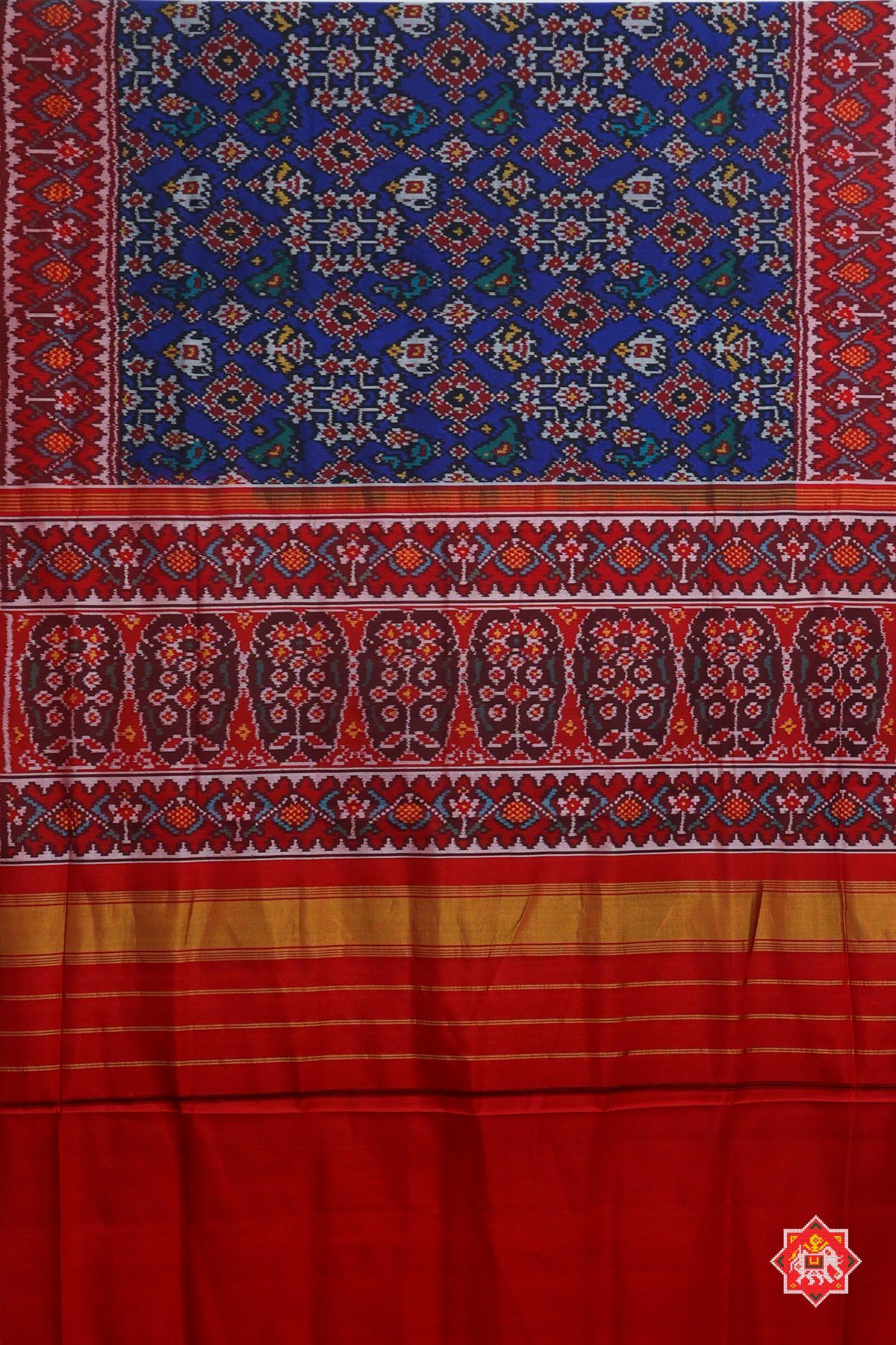 Traditional navratn design with small motif design semi double ikat patola saree