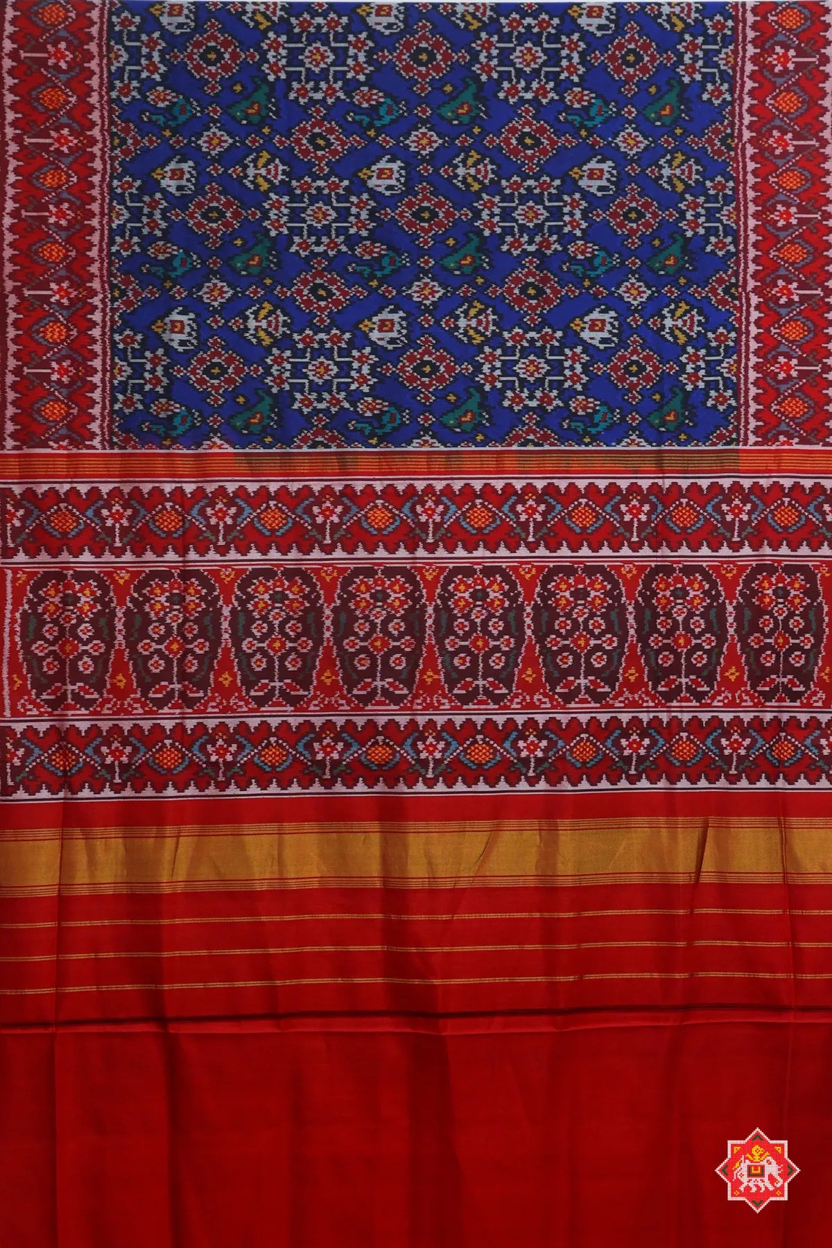 Traditional navratn design with small motif design semi double ikat patola saree