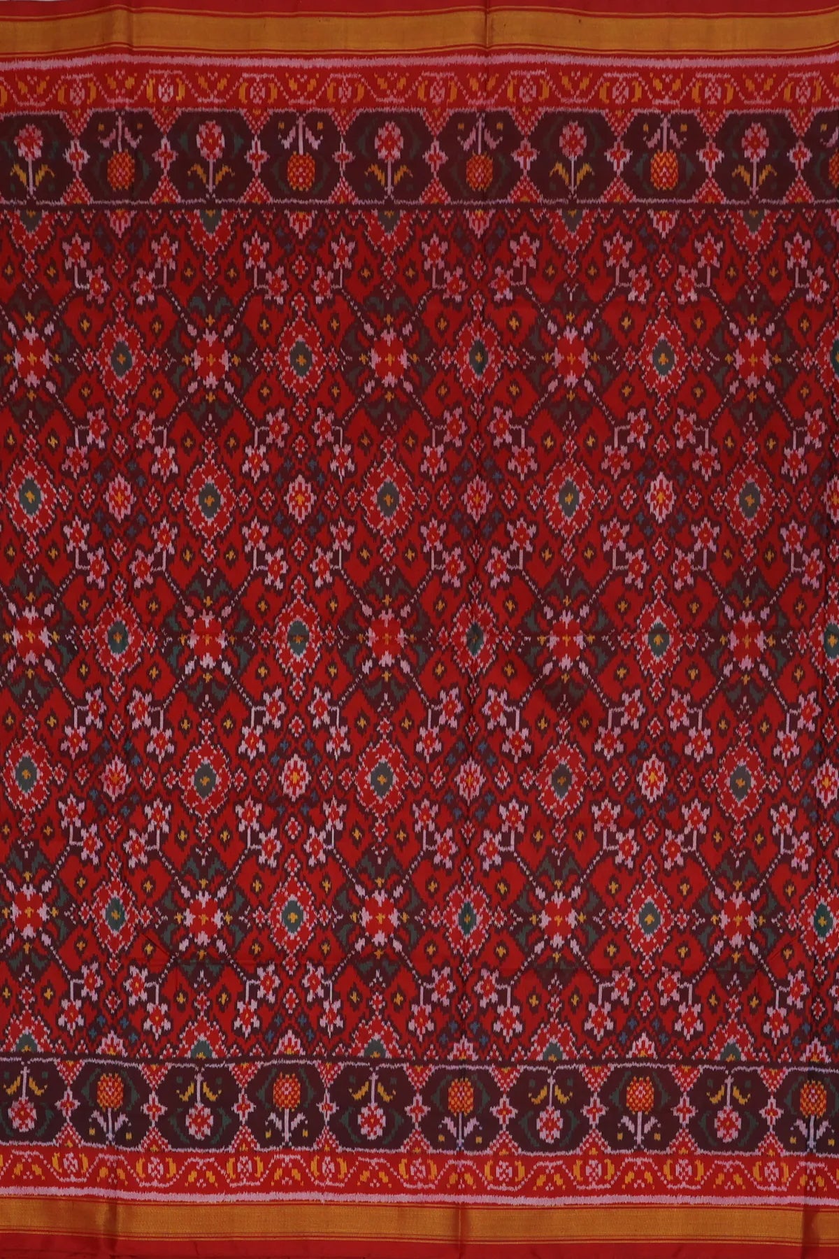Traditional navratna design small tissue border single ikat patola saree