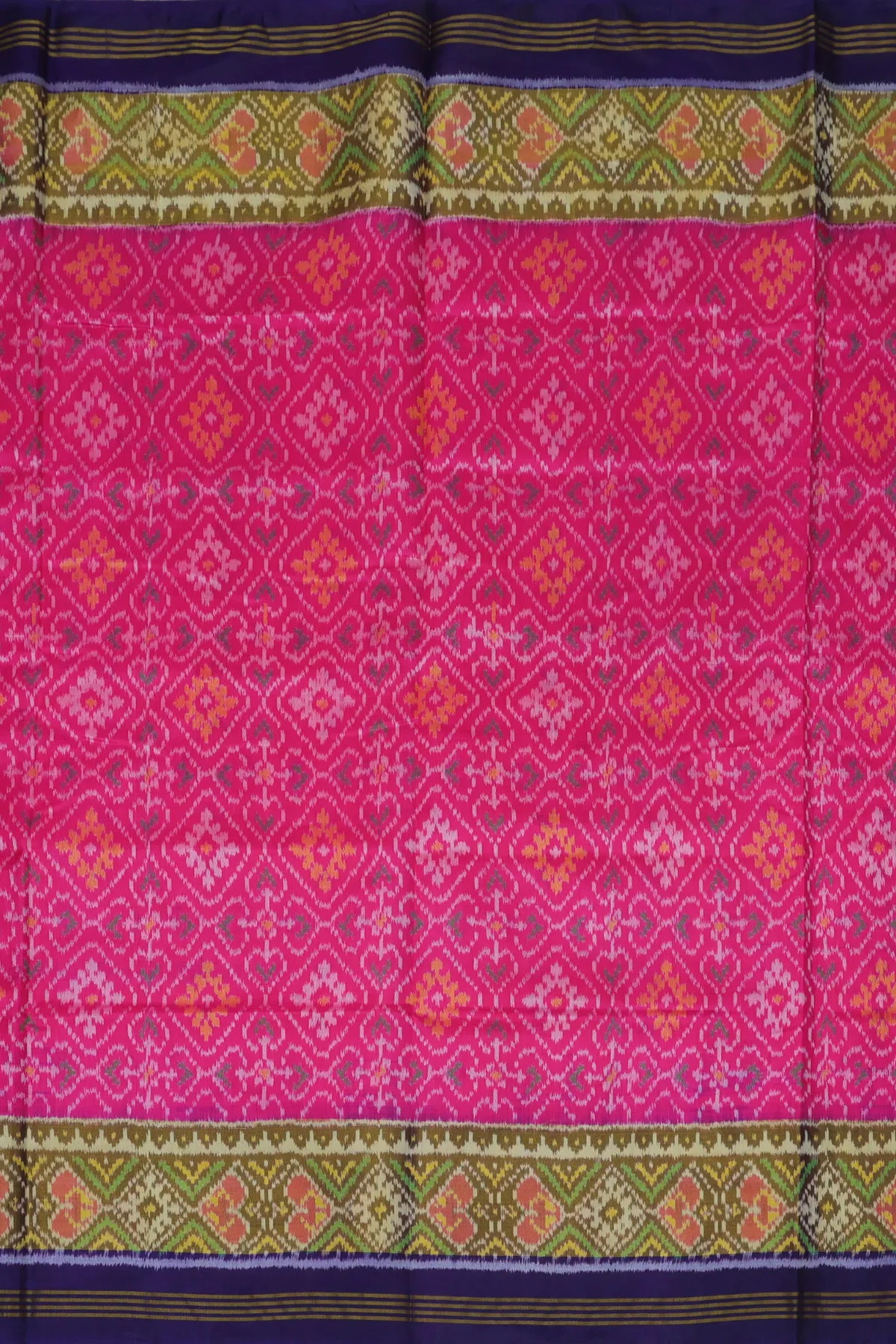 Paan chanda design with tissue border single ikat patola saree