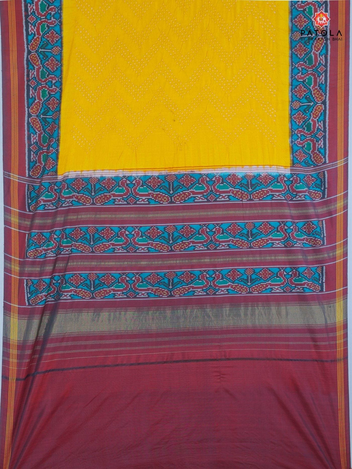 Peacock border with small bandhej patola saree blouse design