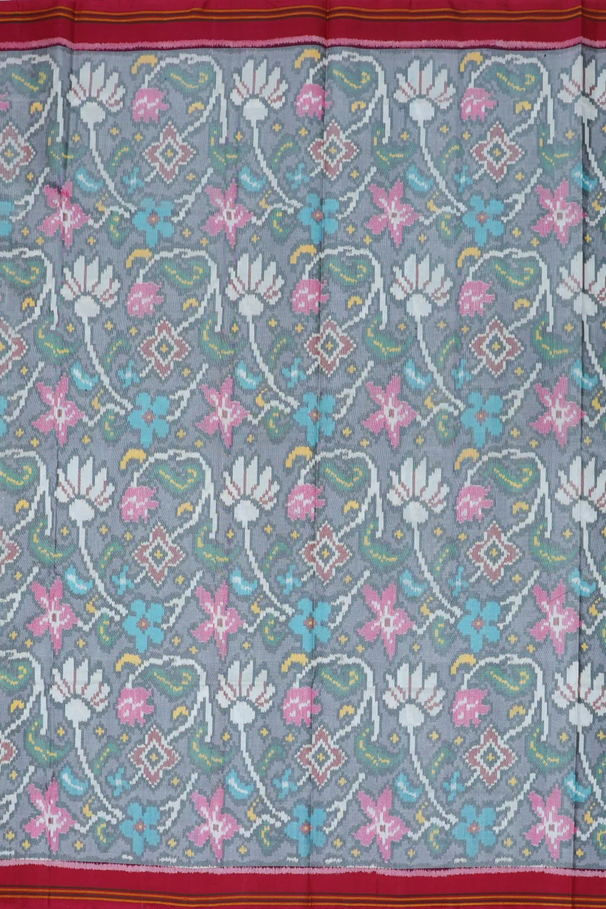 Masterpiece rangoli design with lines border traditional pallu design semi double ikat patola saree