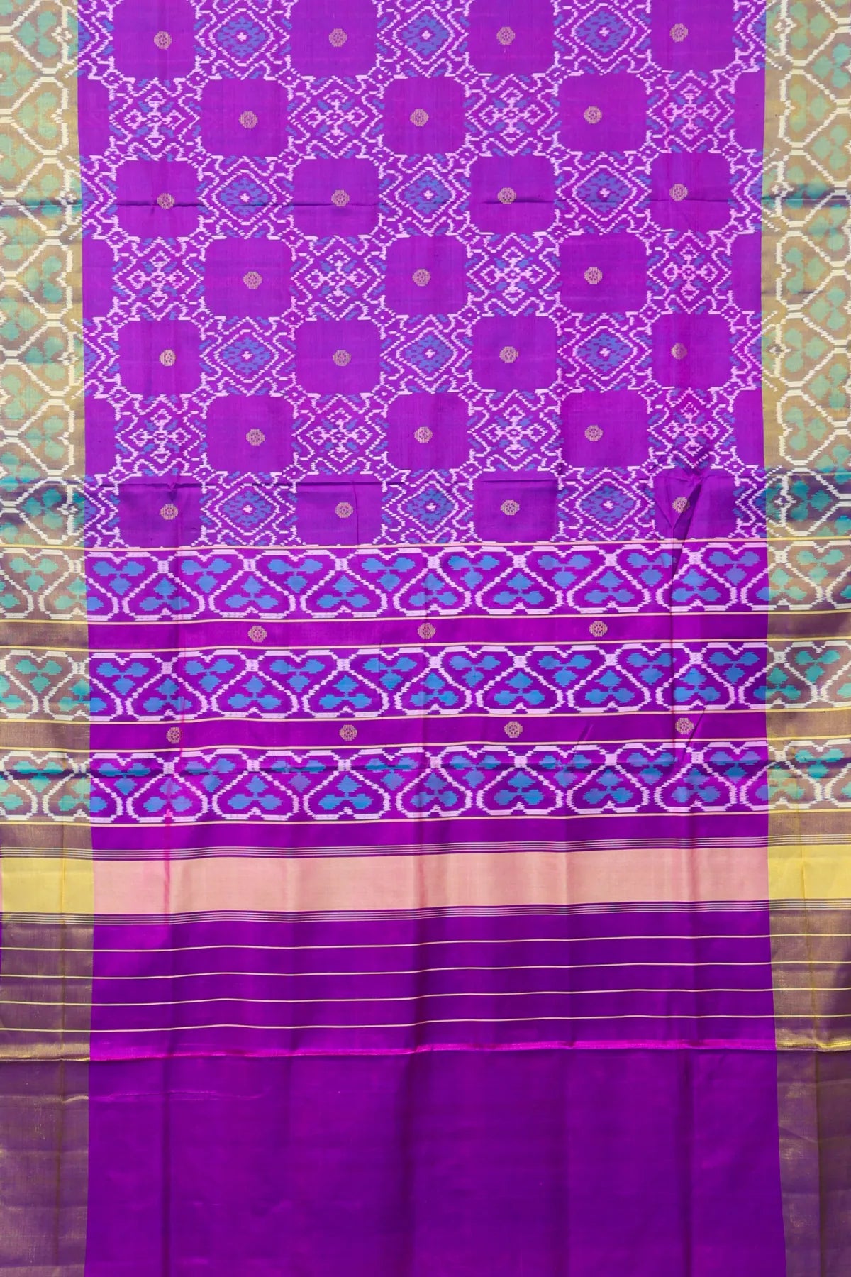 Zig-zag with traditional motifs design border single ikat patola saree