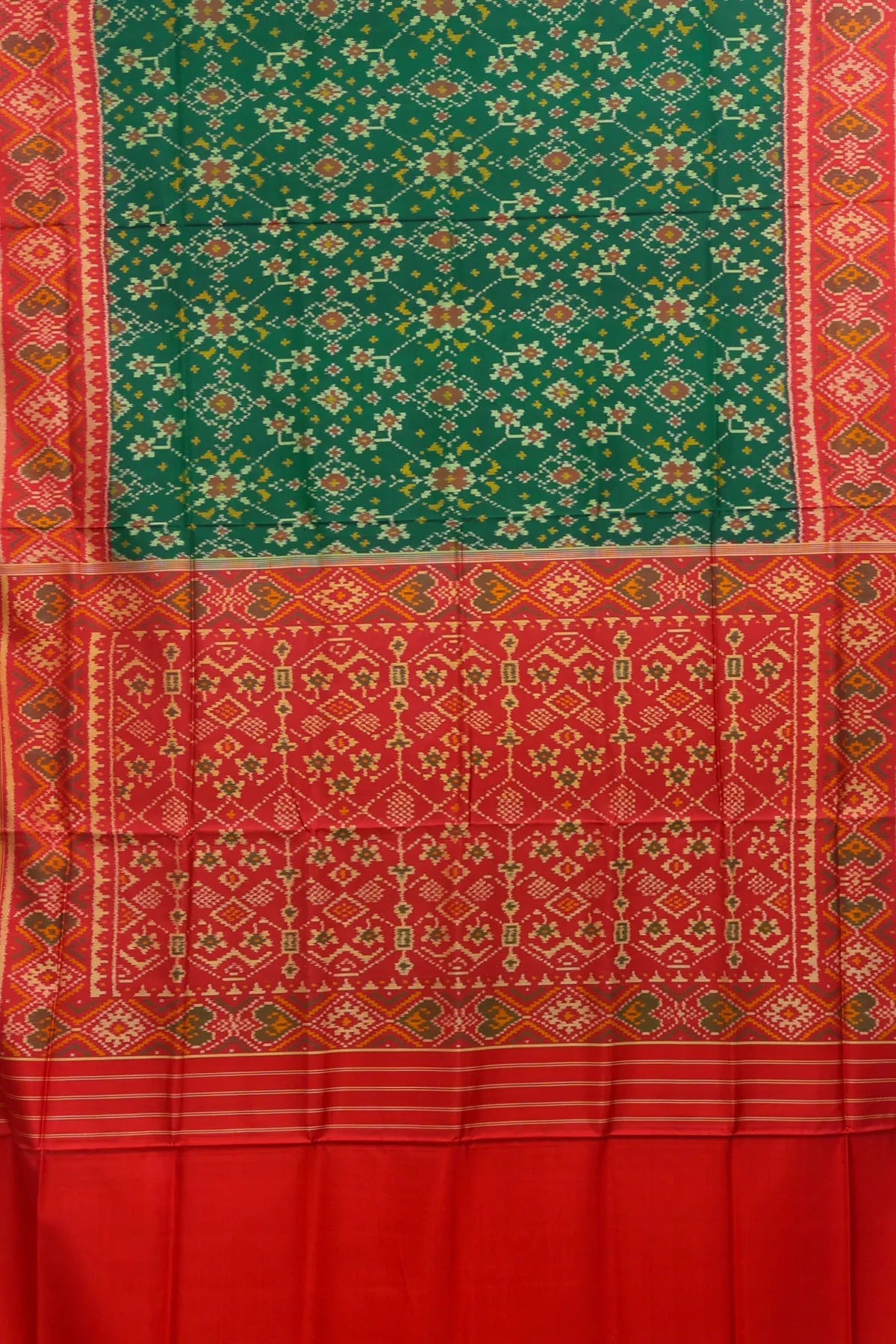 Navratna design with pallu border contras single ikat patola saree