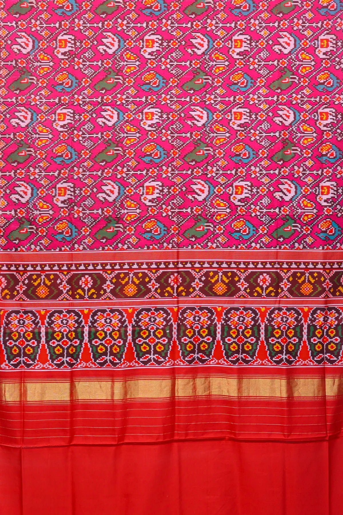 Cross laheriya with motifs design semi double ikat patola saree