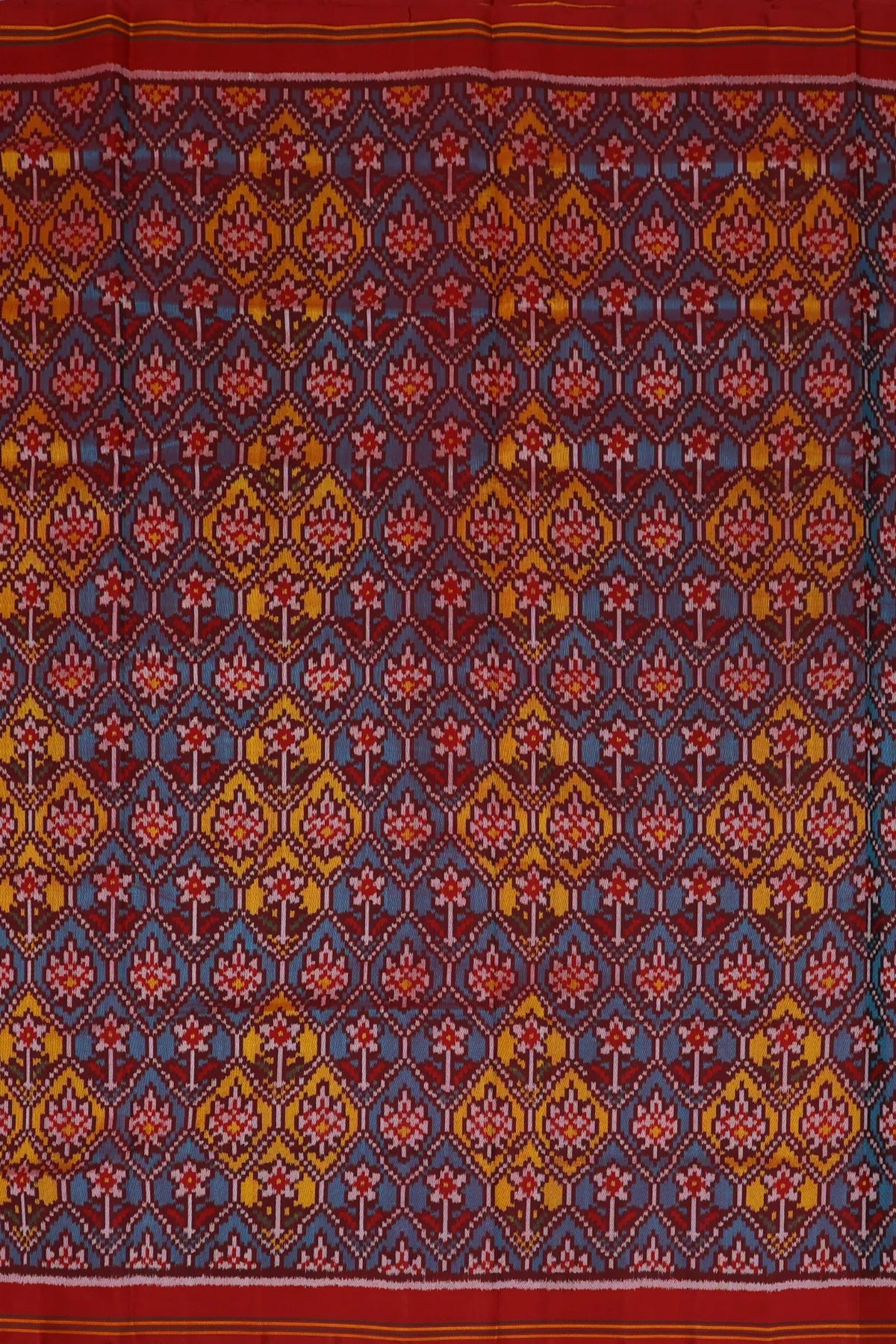 Traditional small flower design & pallu minakari work semi double ikat patola saree