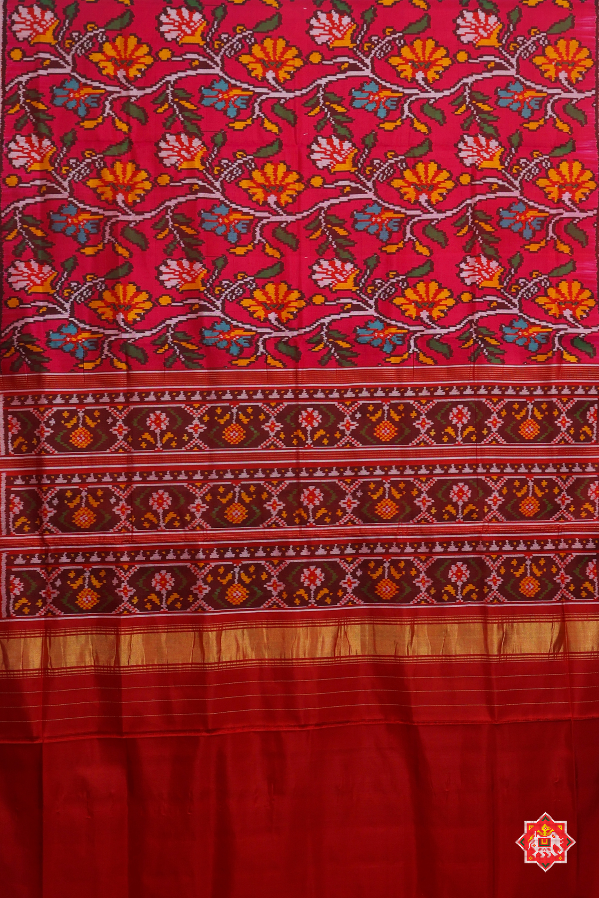 Master piece flowers with leaves design & small lines border semi double ikat patola saree