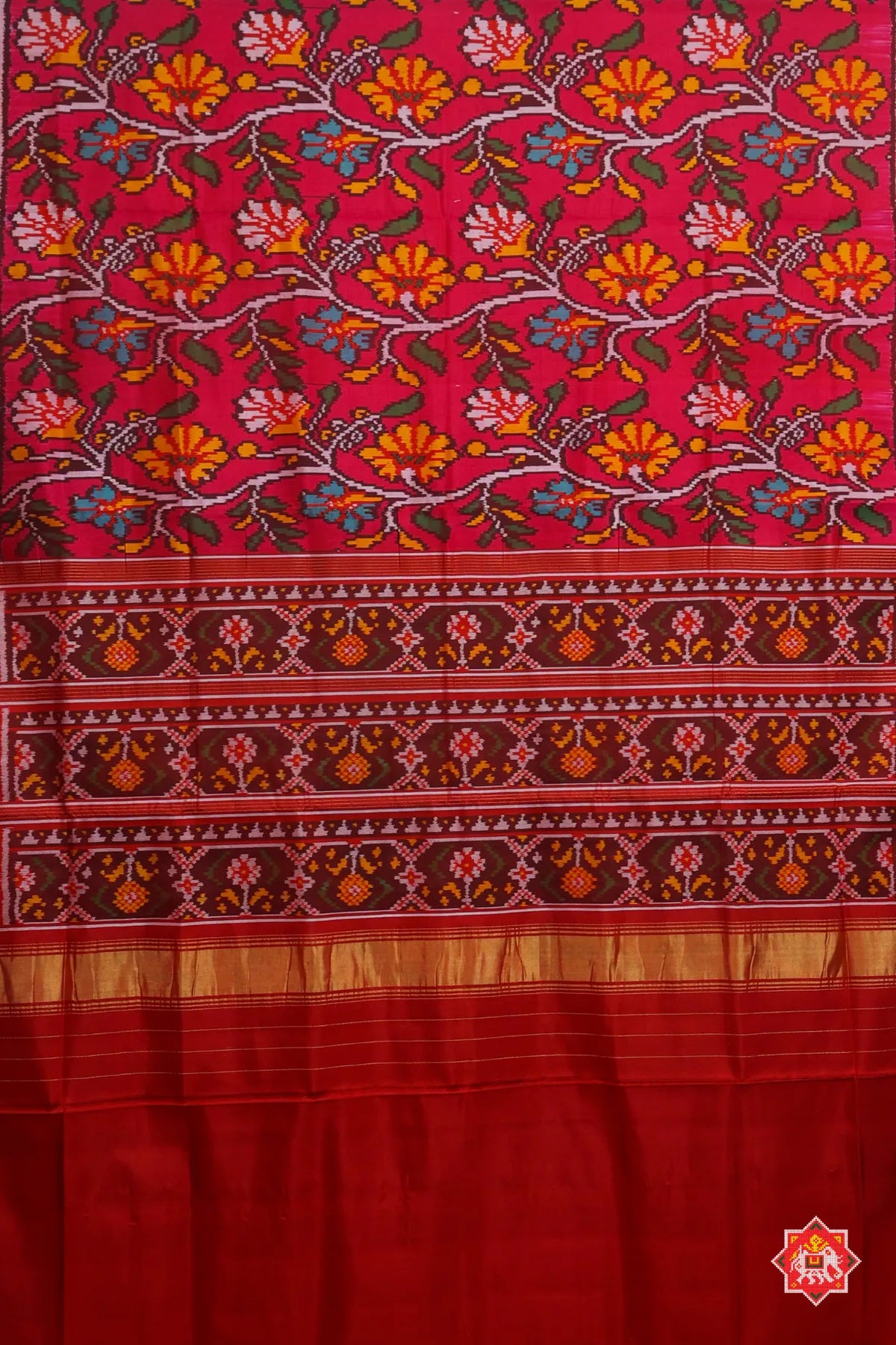 Master piece flowers with leaves design & small lines border semi double ikat patola saree