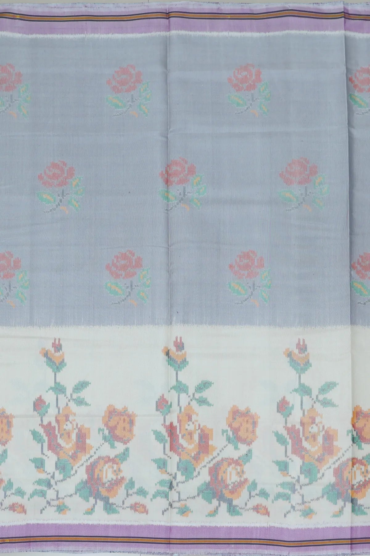 Masterpiece suct border with flower design pallu semi double ikat patola saree