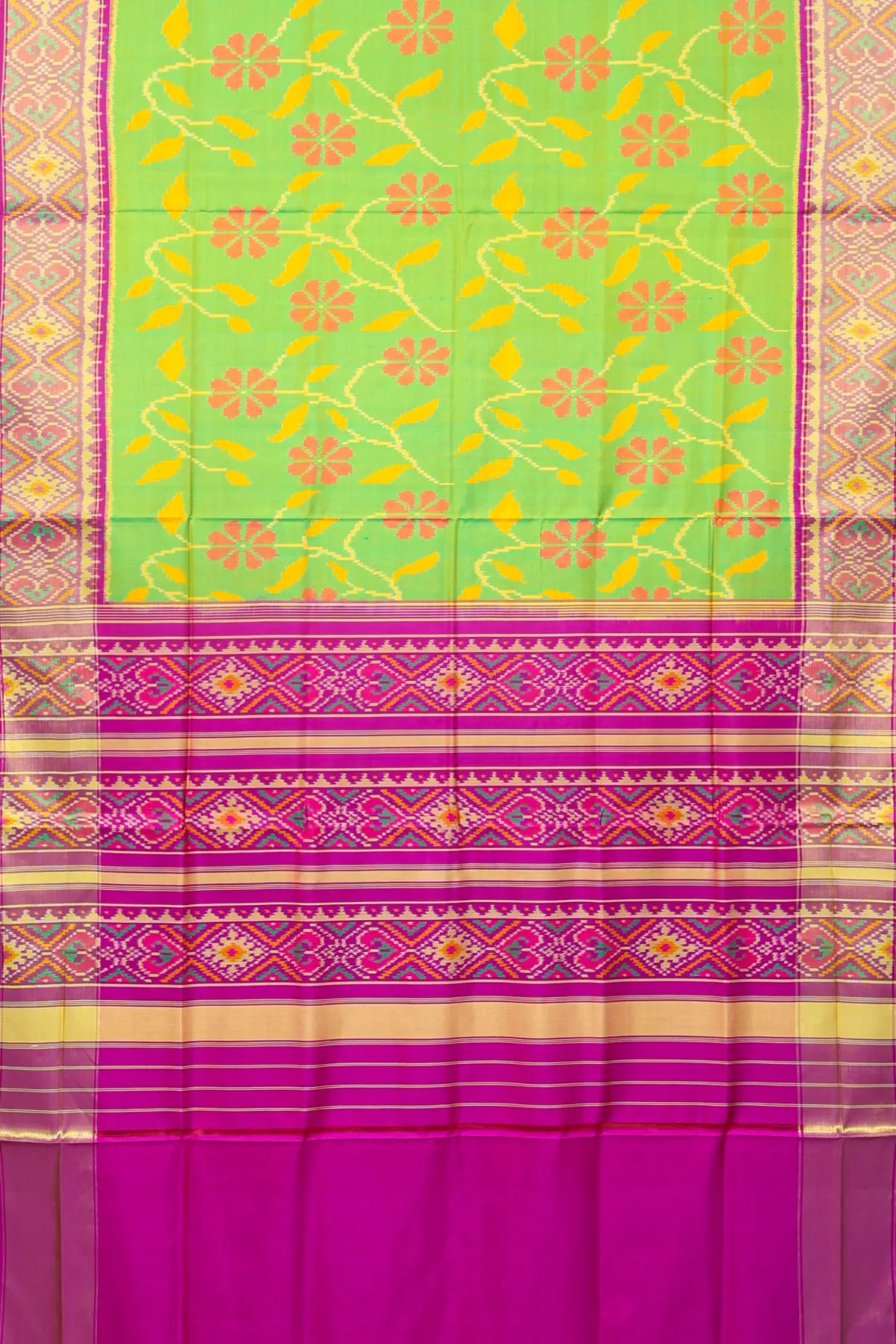Rangoli design with pallu border contras single ikat patola saree