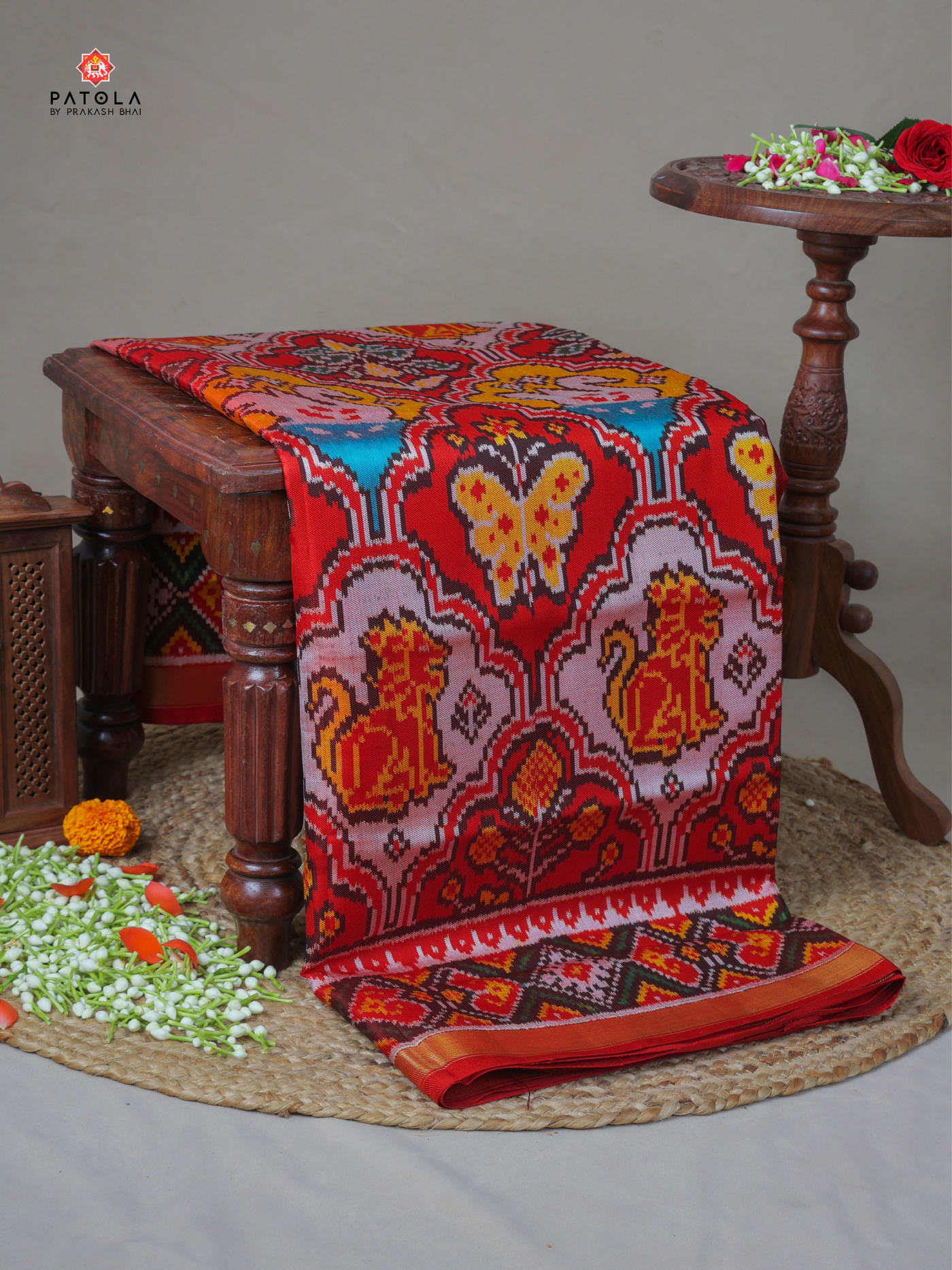 Big motifs with star designer twill patola saree