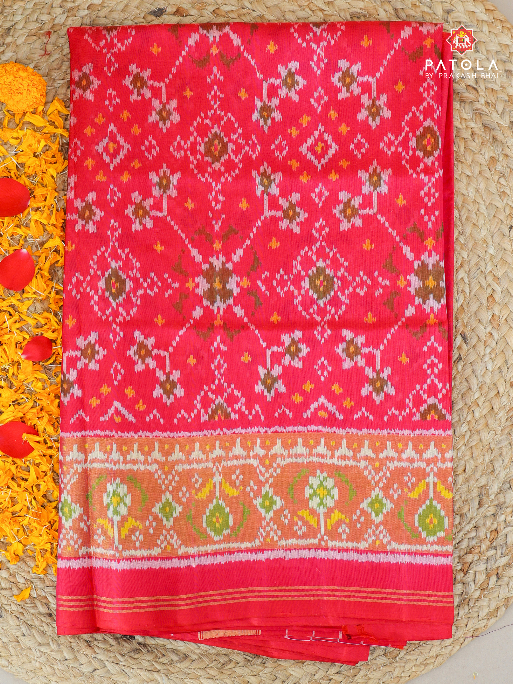 Navratna design with ghughroo border single ikat patola saree