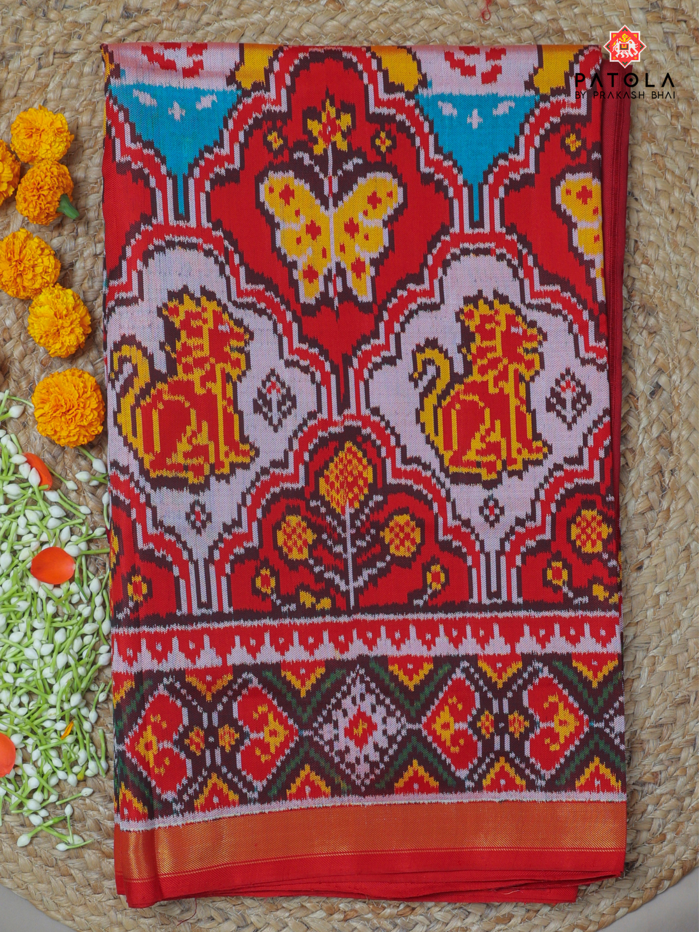 Big motifs with star designer twill patola saree