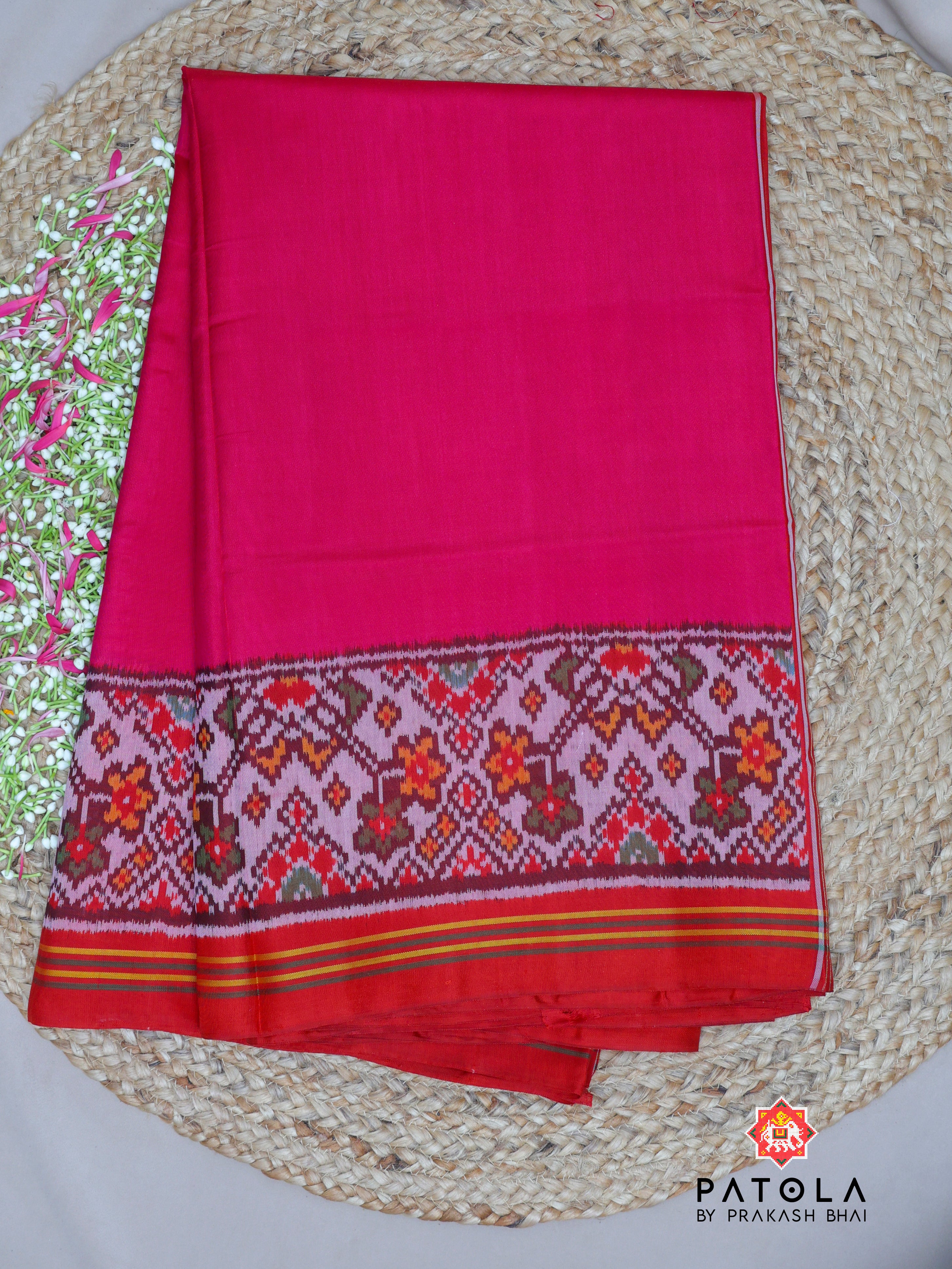 Plain Rani Pink With Navratna Design Border Semi Double Ikat Patola Saree