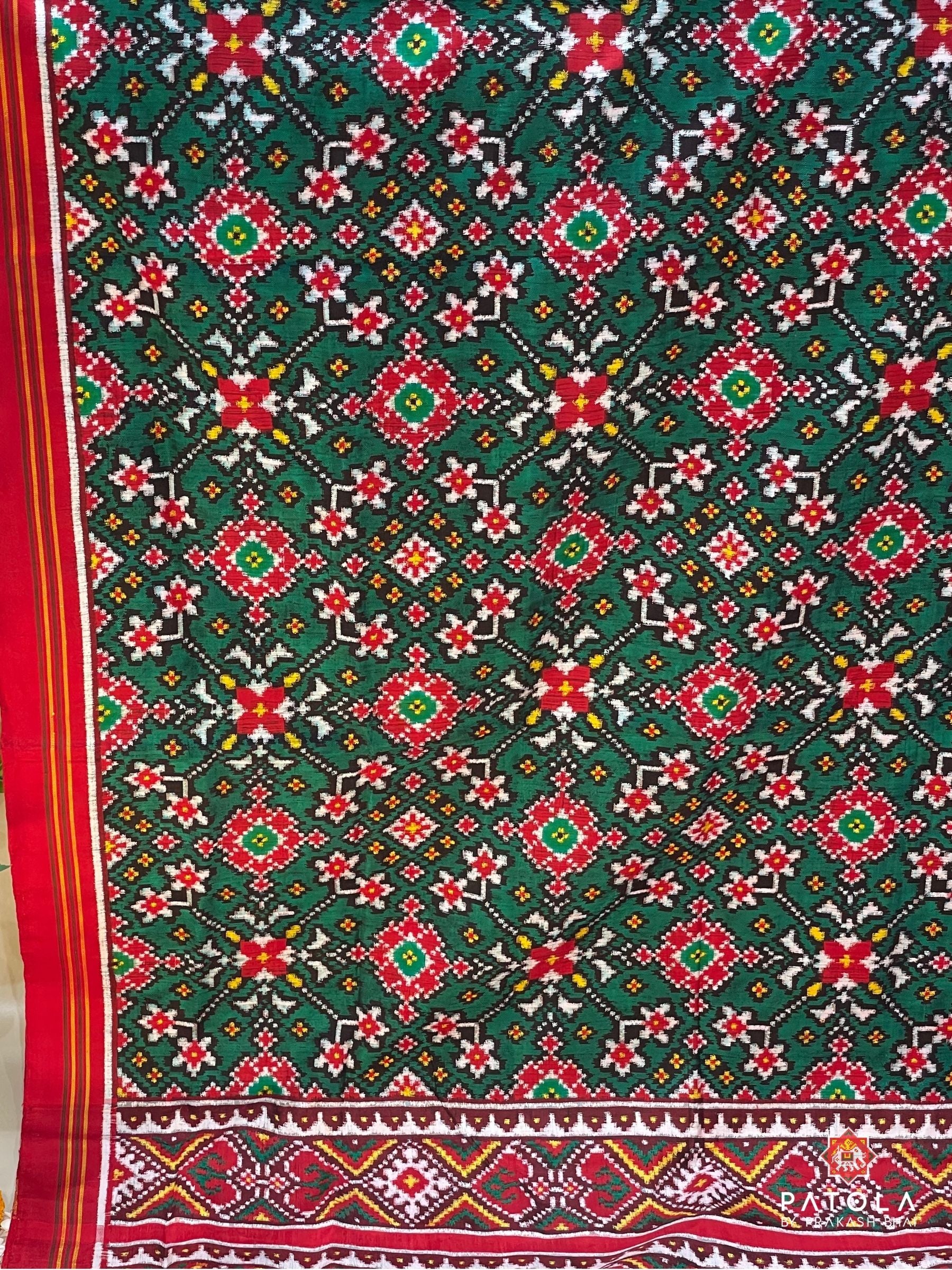 https://patolabyprakashbhai.com/products/pure-double-ikat-star-figures-designer-dupatta