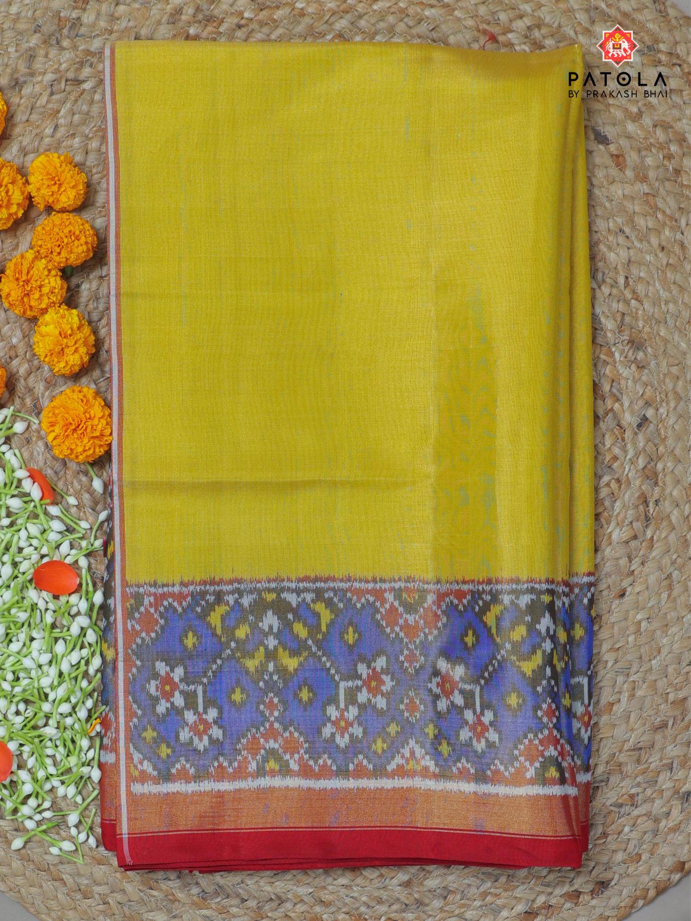 Plain Yellow with navratna border tissue patola saree