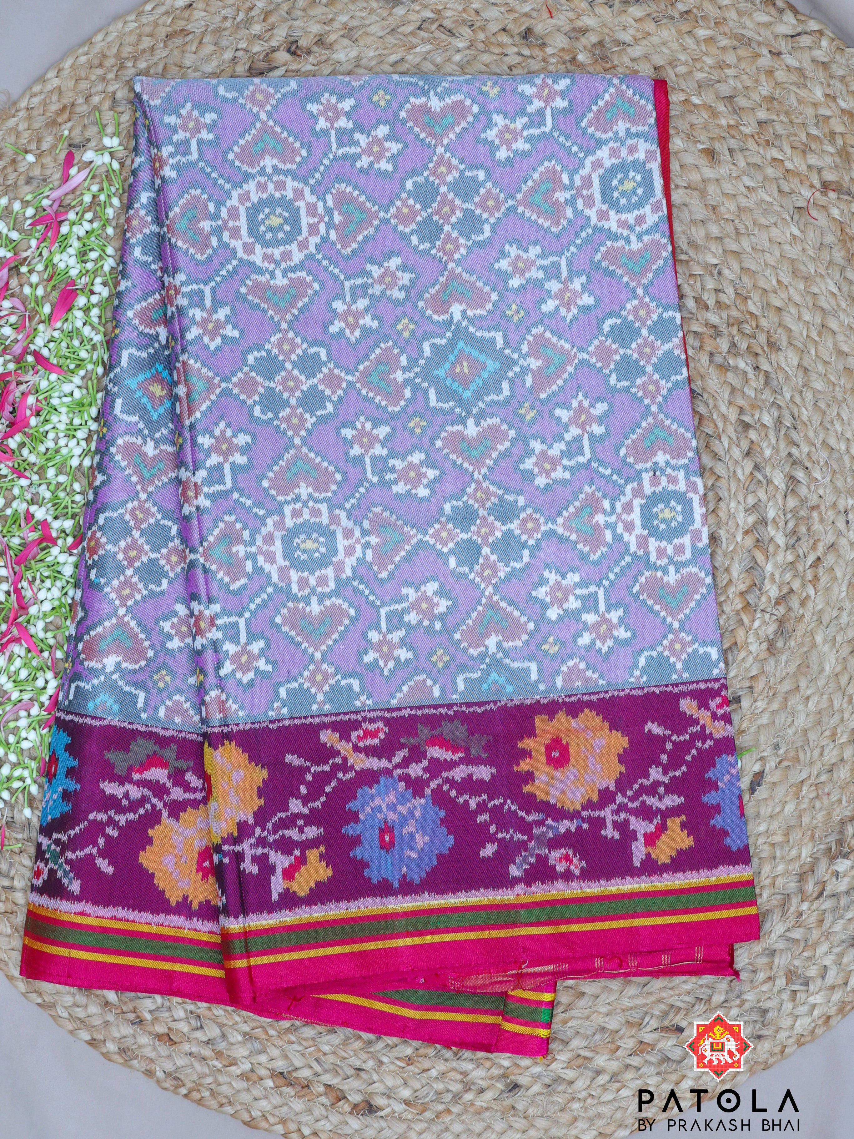 Navratna Pan Chanda Mix With Flower Border Semi Double Ikat Patola Sareee