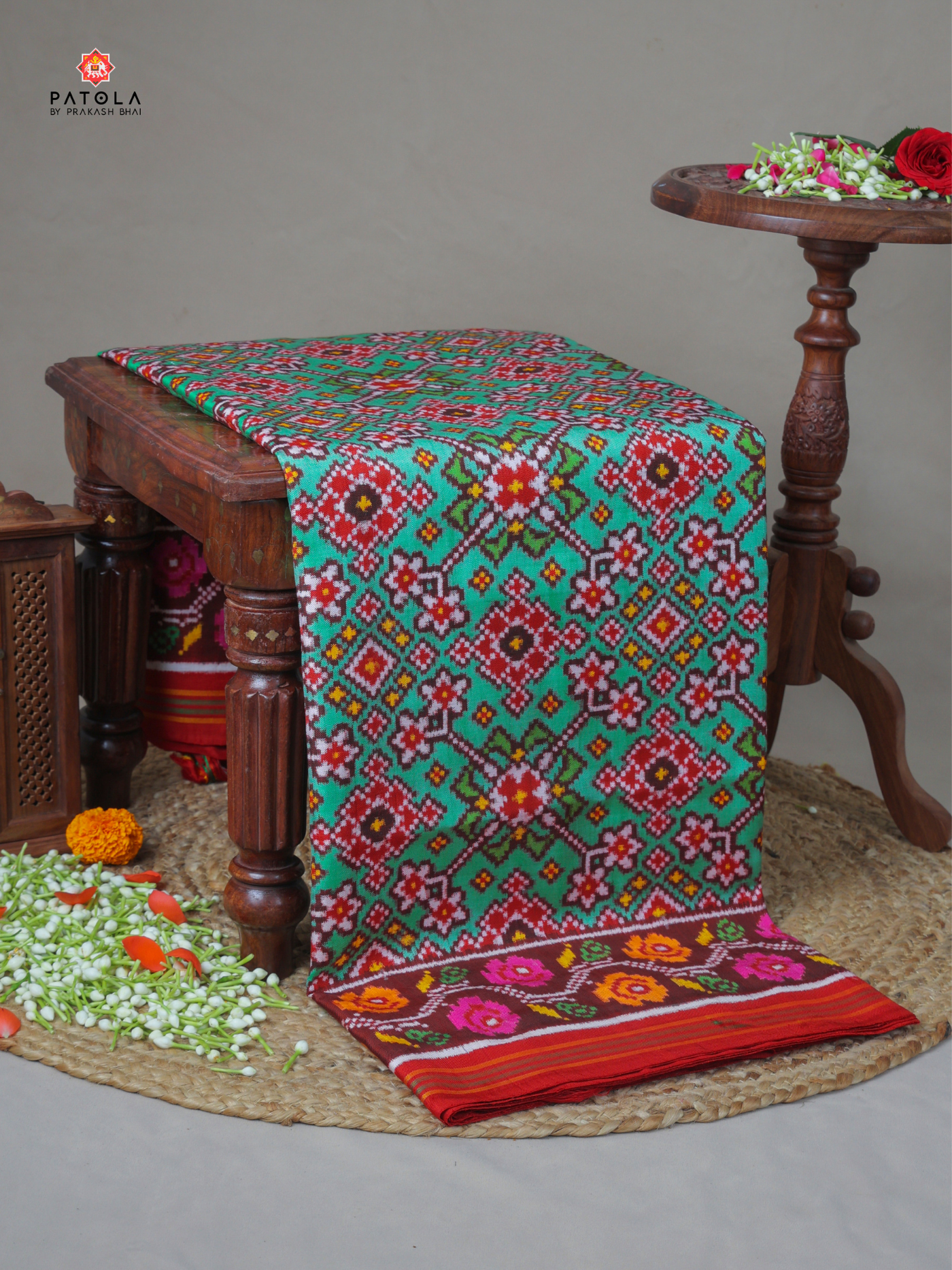 Pista navratna design with flowers border pure double ikat patola saree