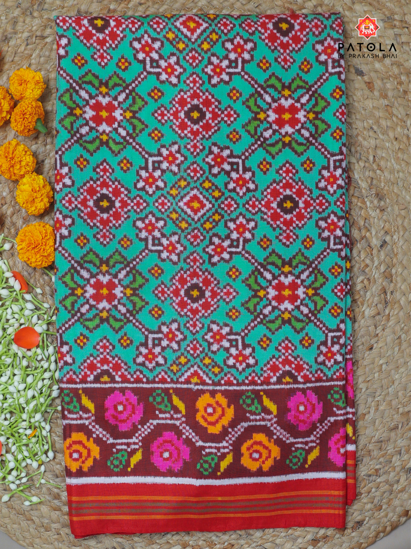 Pista navratna design with flowers border pure double ikat patola saree