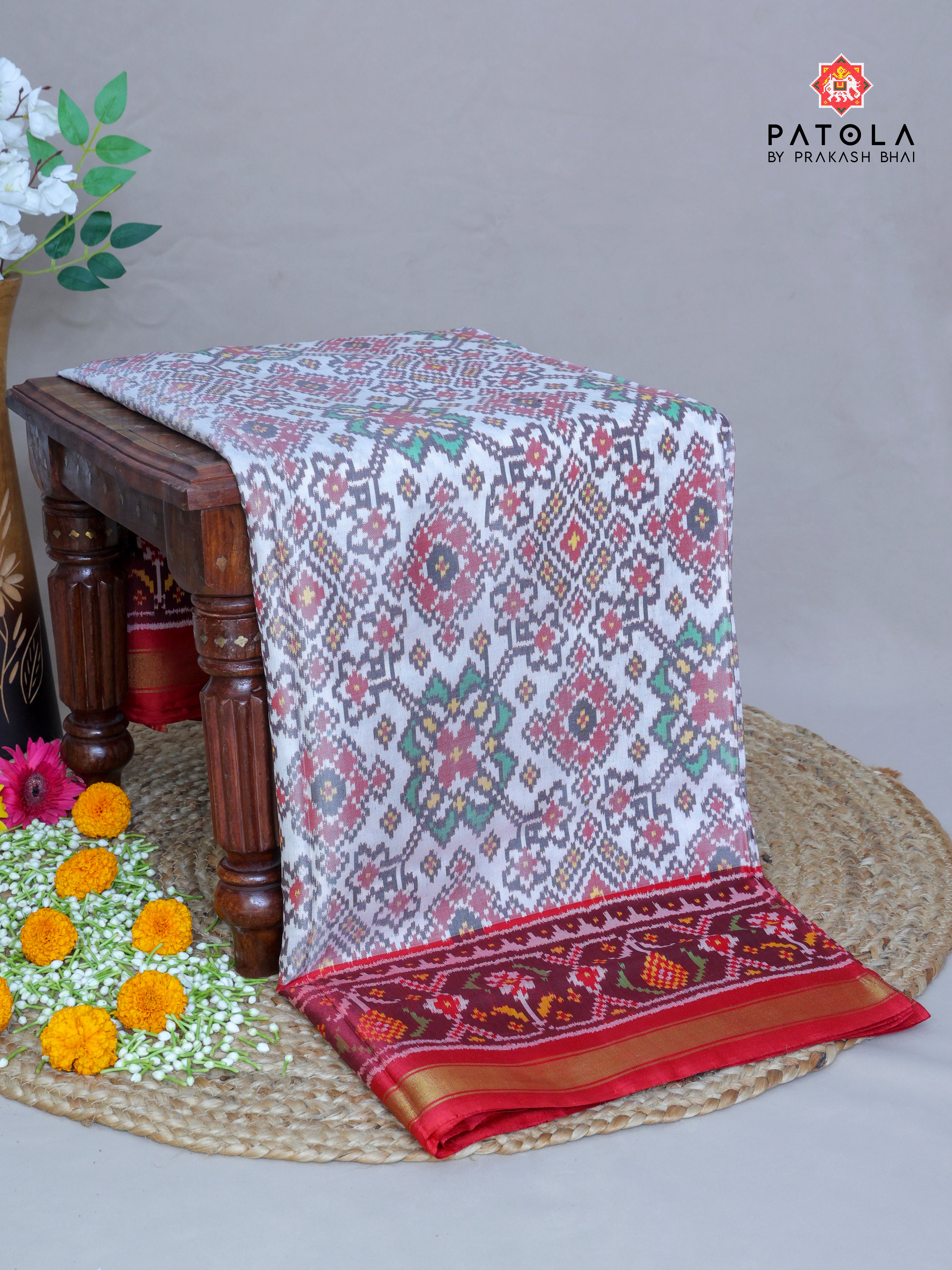 White Navratna Design Semi Double Ikat Patola Saree